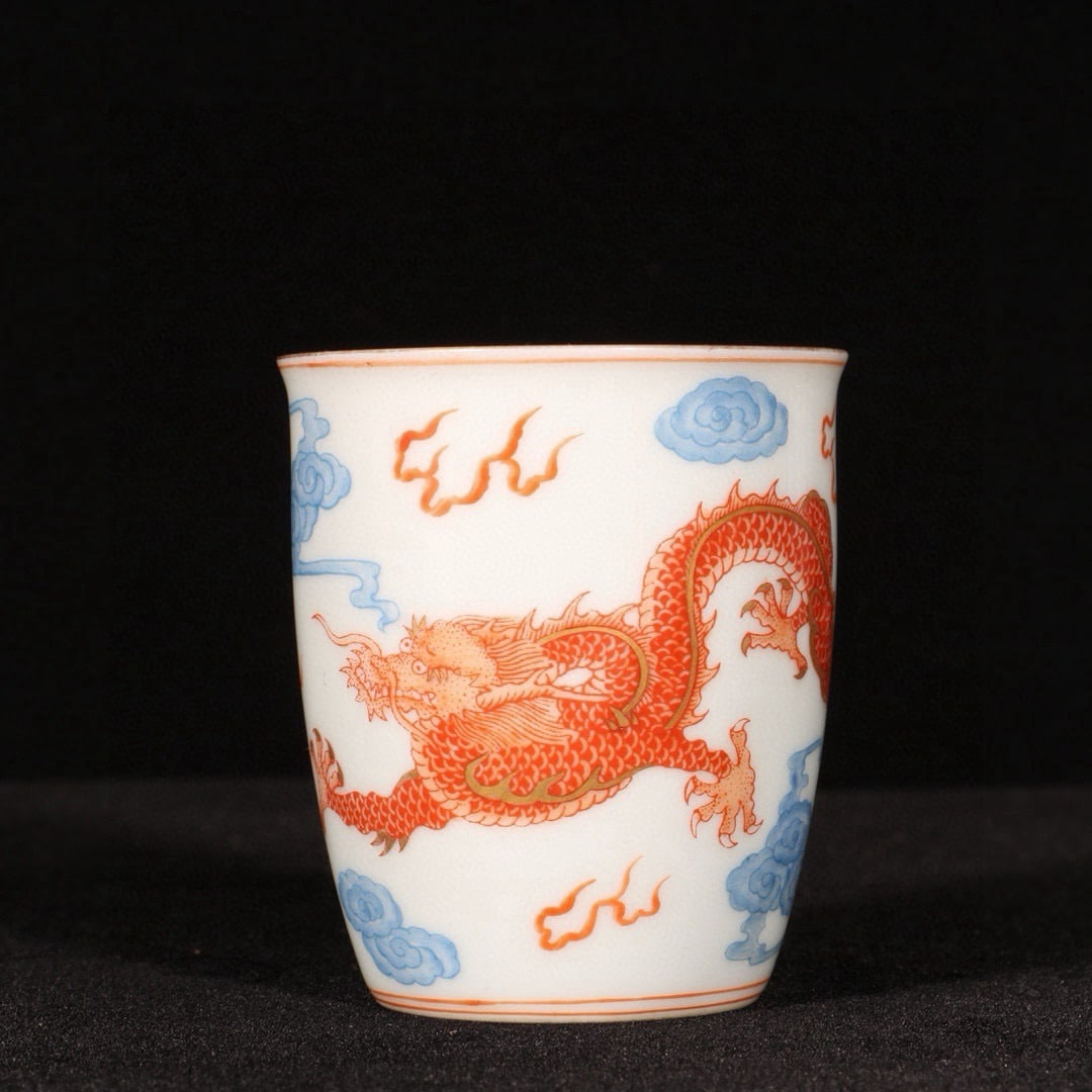 An Exquisite Iron-Red Painted Gold Auspicious Cloud and Dragon Pattern Cup: An Exquisite Iron-Red Painted Gold Auspicious Cloud and Dragon Pattern Cup,Qing Dynasty,China,Yongzheng Four-character Mark,Size:2.6inx2.2in 矾红描金祥云龙