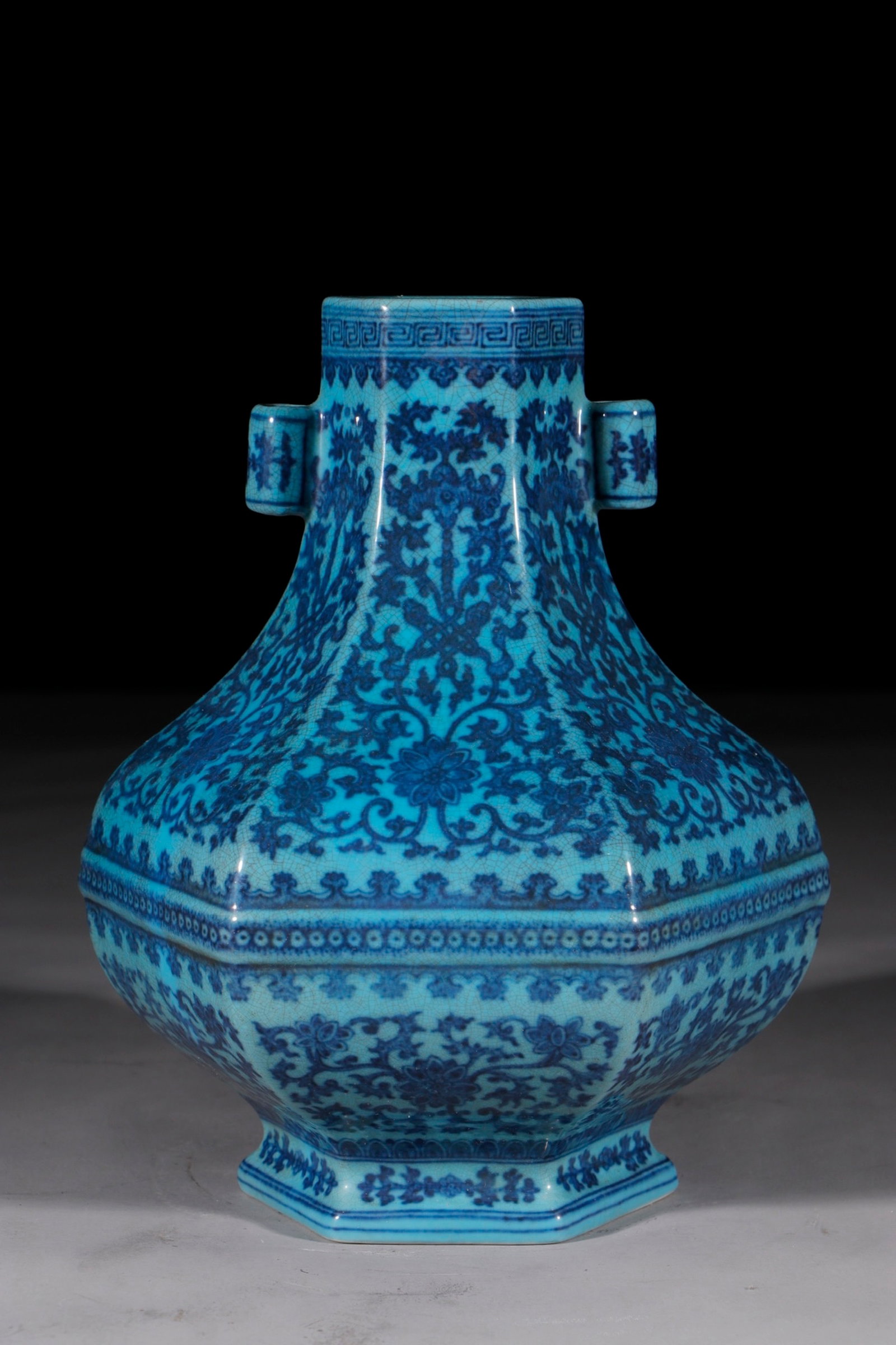 An Exquisite Green Ground Blue and White Lotus Pattern Double-Ears Vase: An Exquisite Green Ground Blue and White Lotus Pattern Double-Ears Vase,Qing Dynasty,China,Qianlong Six-character Mark,Size:11in 绿地青花缠枝莲纹双