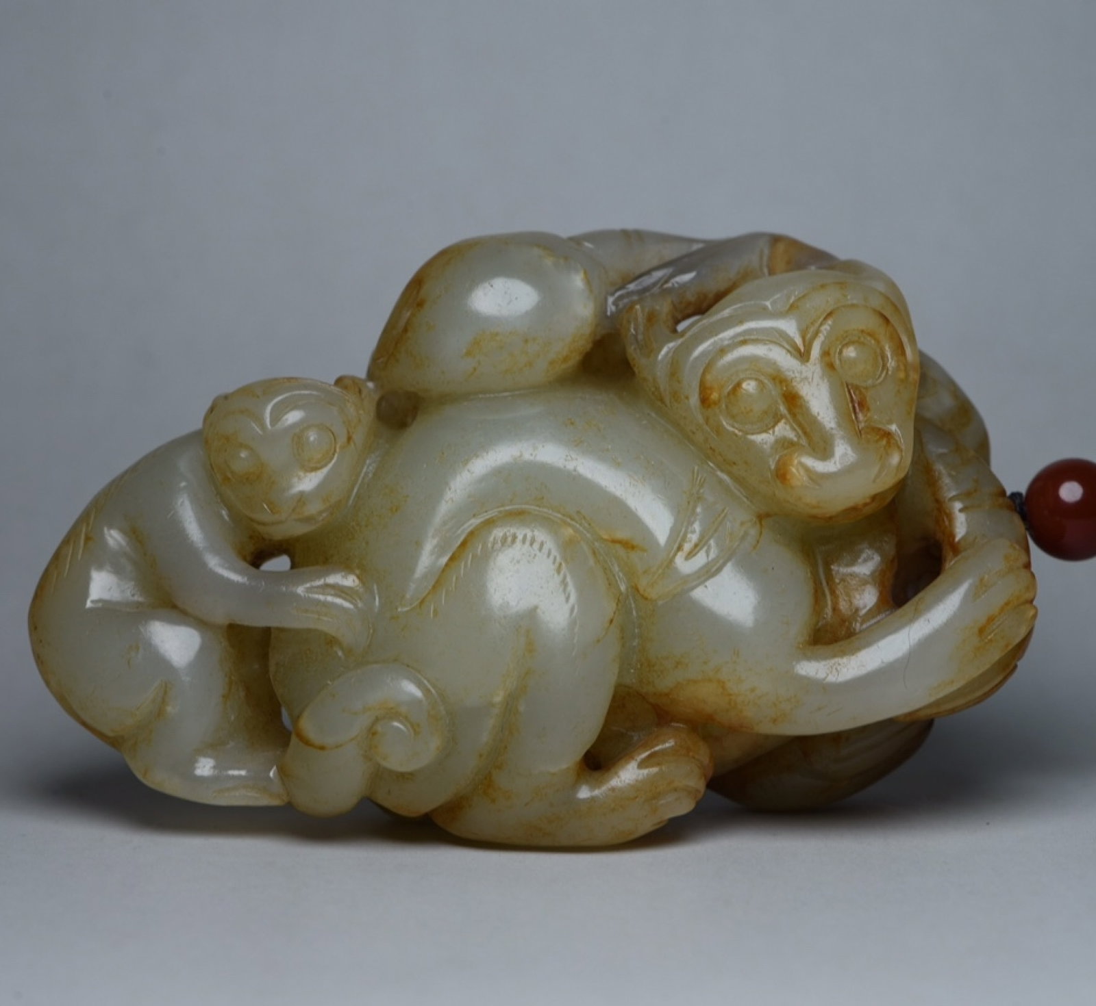 An Exquisite White Jade Monkey Ornament: An Exquisite White Jade Monkey Ornament,Qing Dynasty,China,Size:3.9inx2.4inx1.3in,Weight:256g 白玉猴子摆件,中国清代