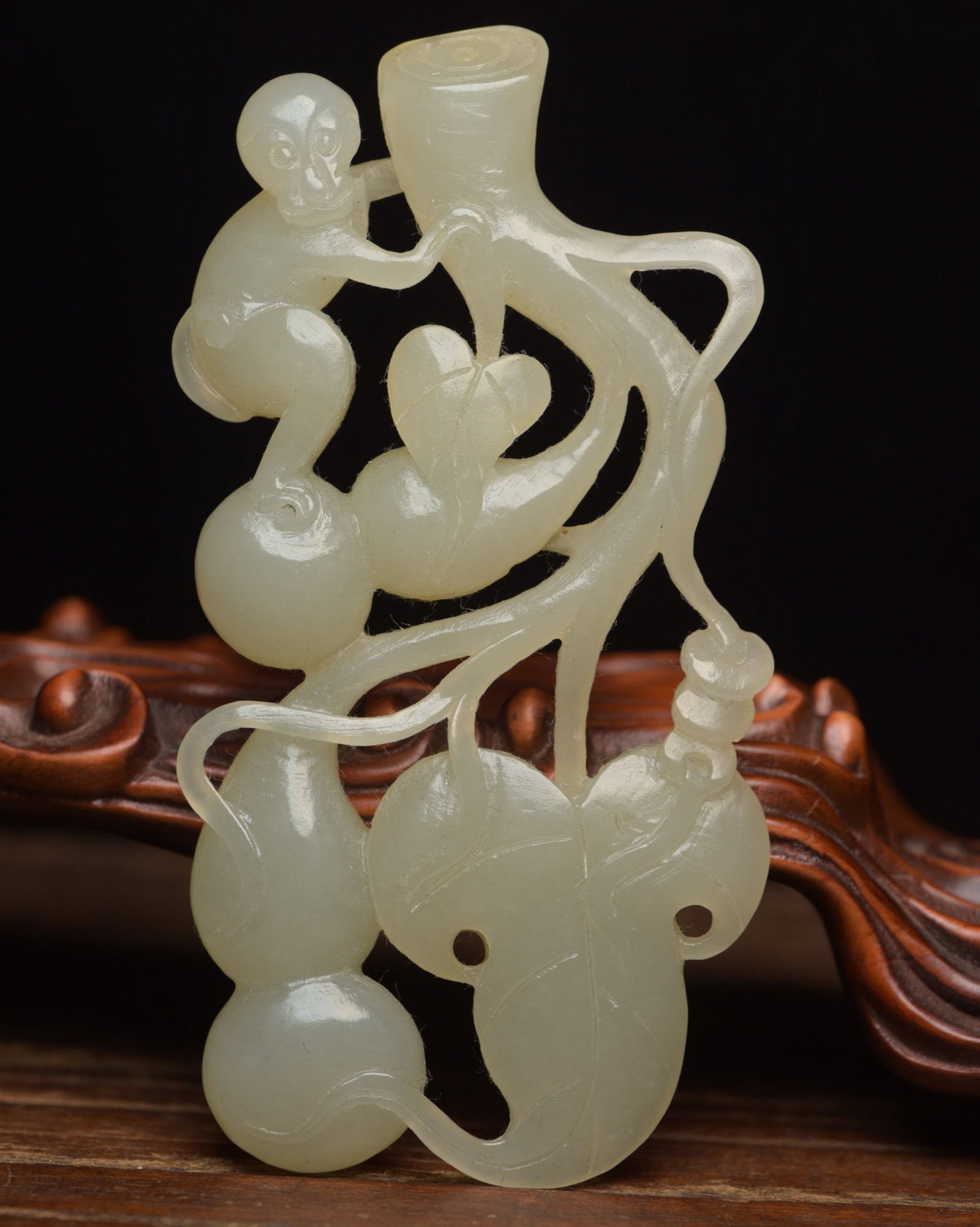 An Exquisite White Jade Monkey Pendant: An Exquisite White Jade Monkey Pendant,Qing Dynasty,China,Size:3.5inx1.8inx0.3in,Weight:44g 白玉猴子佩,中国清代
