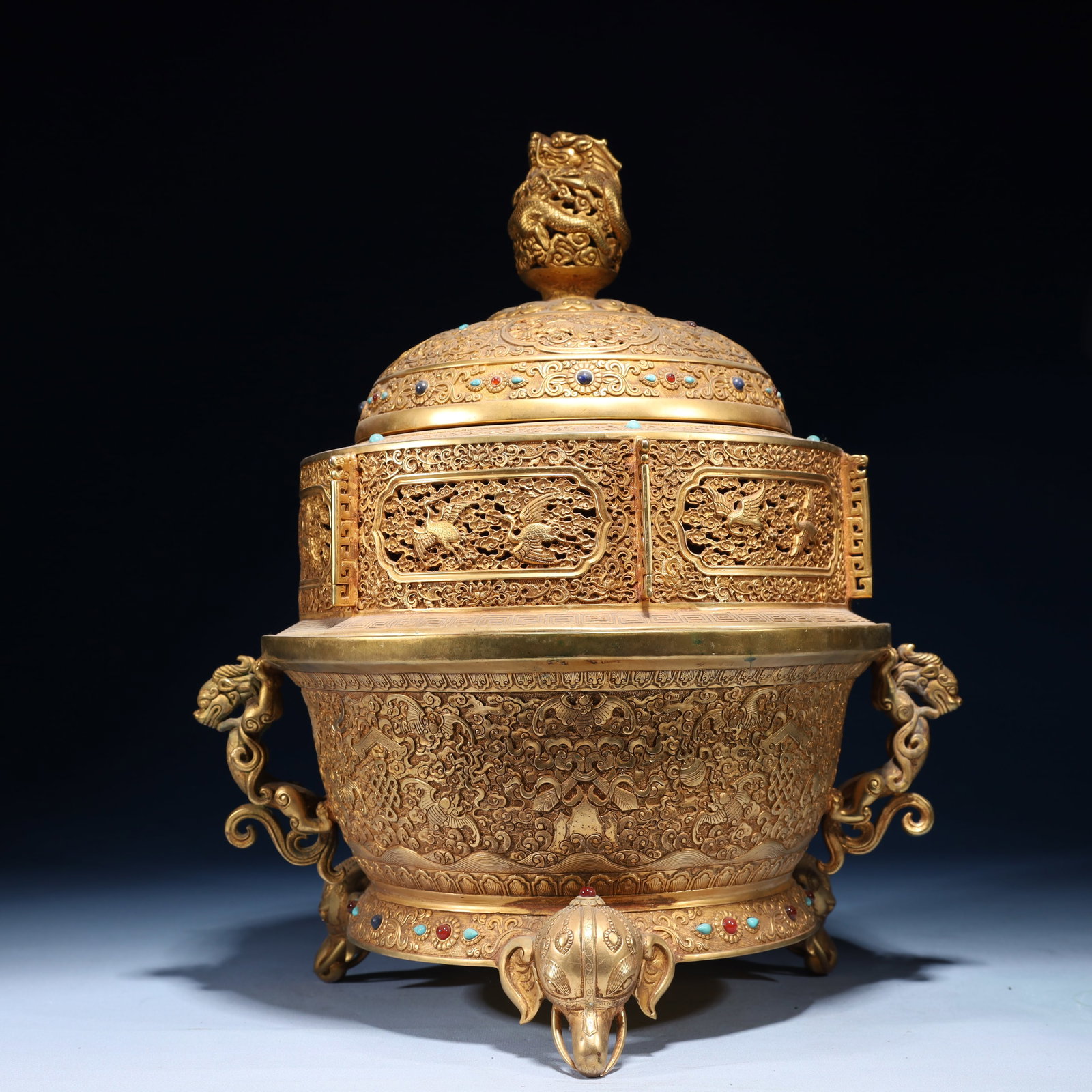 An Exquisite Gilt Bronze Eight Treasures Pattern Double-Ears and Tripod Censer: An Exquisite Gilt Bronze Eight Treasures Pattern Double-Ears and Tripod Censer,Qing Dynasty,China,Size:13inx10.2inx13.8in,Weight:6200g
