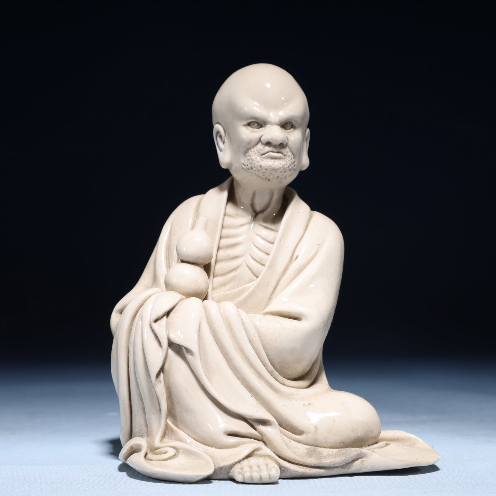 A Solemn Blance-De-Chine Statue of Dharma: A Solemn Blance-De-Chine Statue of Dharma Blance-De-Chine Statue of Dharma,Ming Dynasty,China,He Chaozong Mark,Size:4.3inx3.5inx6.3in,Weight:650g 德化瓷达摩像,È
