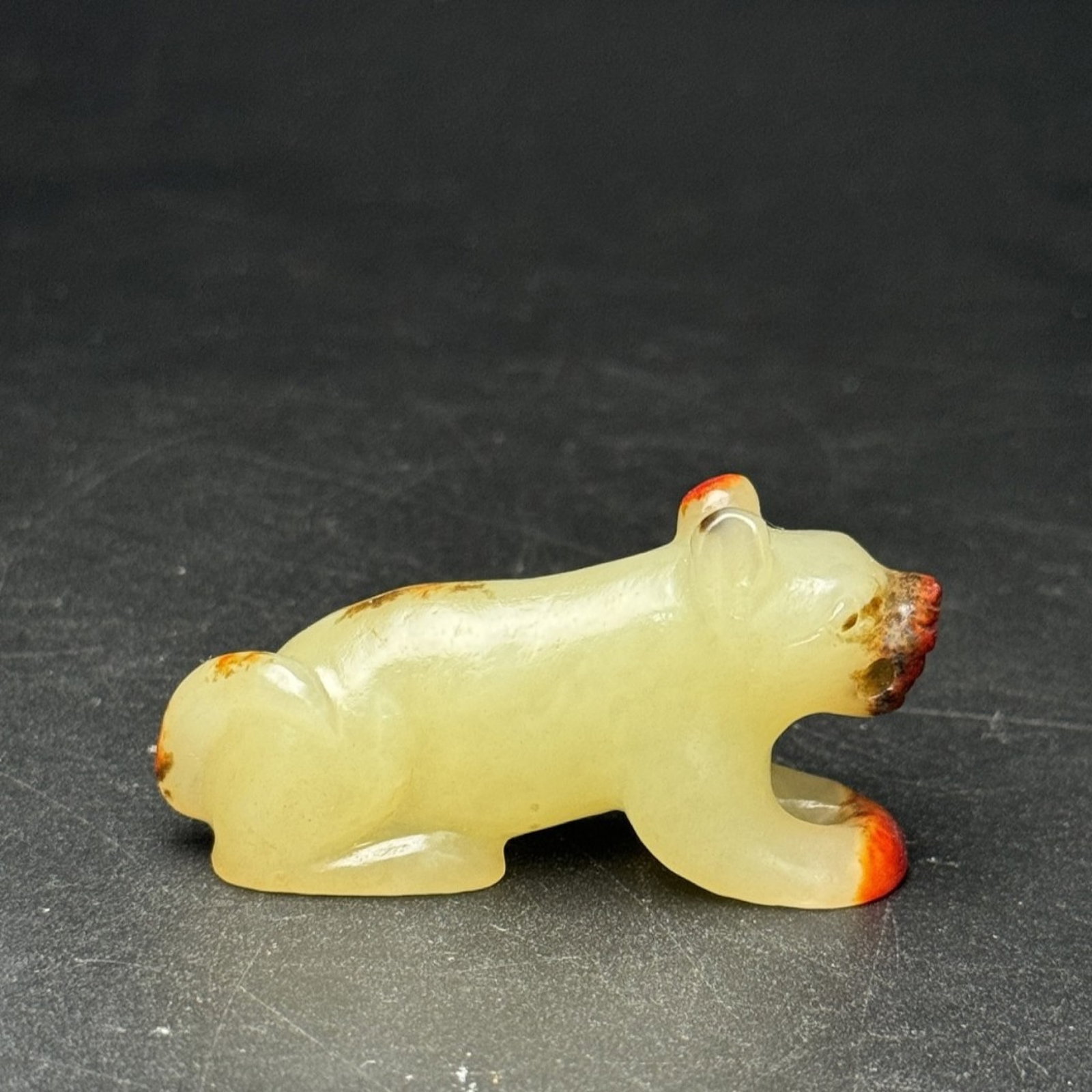 An Exquisite White Jade Tiger Pendant: An Exquisite White Jade Tiger Pendant,Qing Dynasty, China,Size:52mmx27mmx14mm,Weight:26g 白玉老虎挂件,中国清代