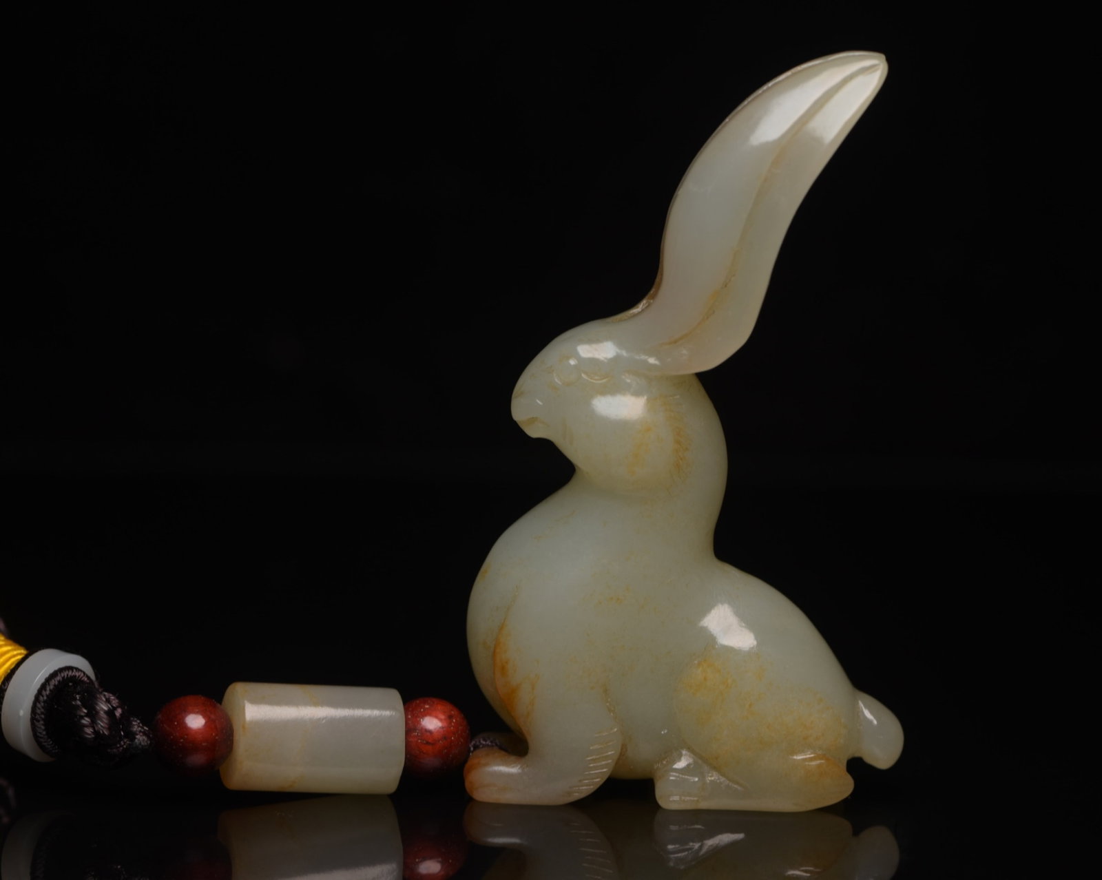 An Exquisite White Jade Rabbit Pendant: An Exquisite White Jade Rabbit Pendant,Qing Dynasty,China,Size:2.9inx1.7inx0.7in,Weight:57g 白玉兔子挂件,中国清代