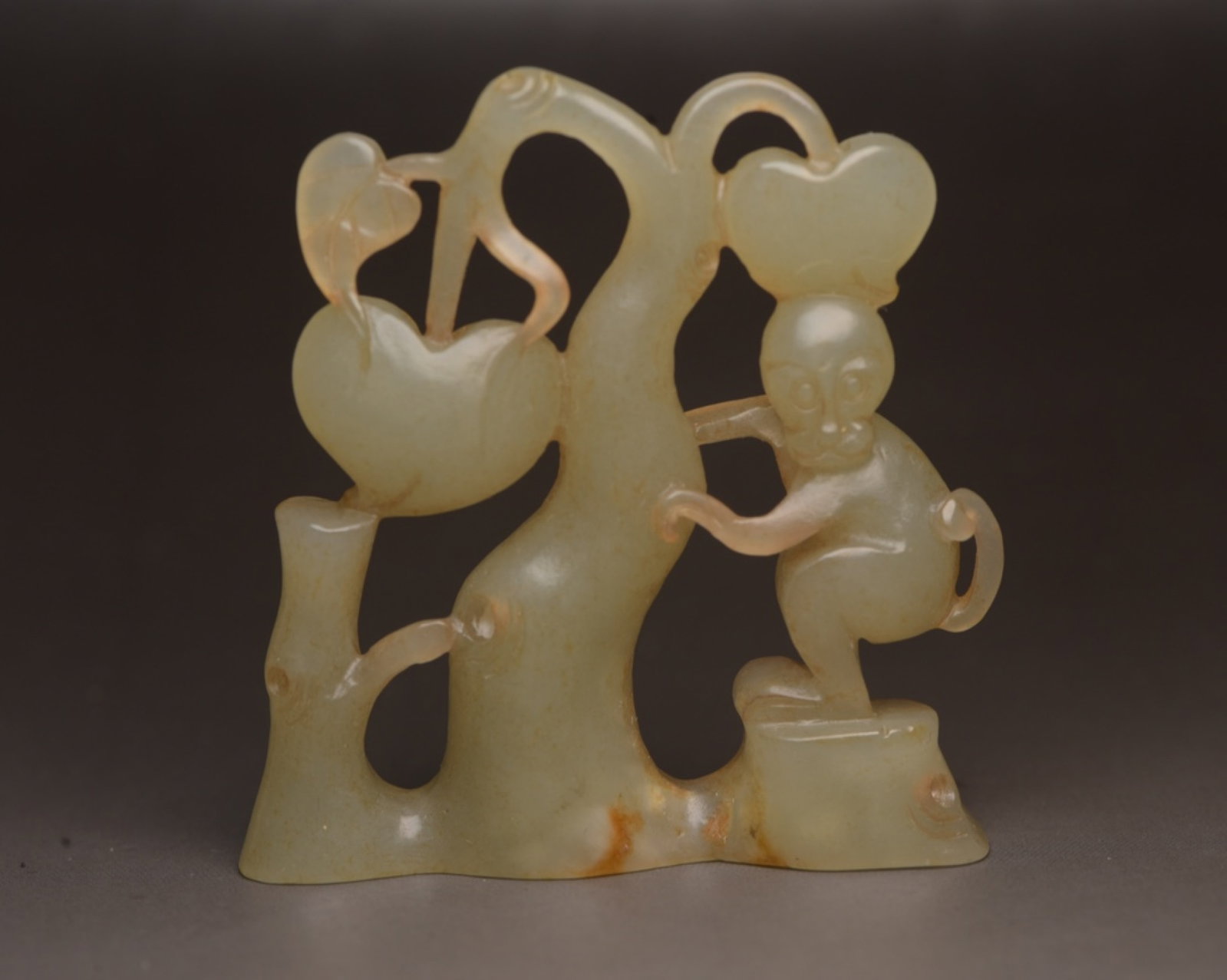 An Exquisite White Jade Monkey Ornament: An Exquisite White Jade Monkey Ornament,Qing Dynasty,China,Size:2.1inx1.9inx0.5in,Weight:30g 白玉猴子摆件,中国清代