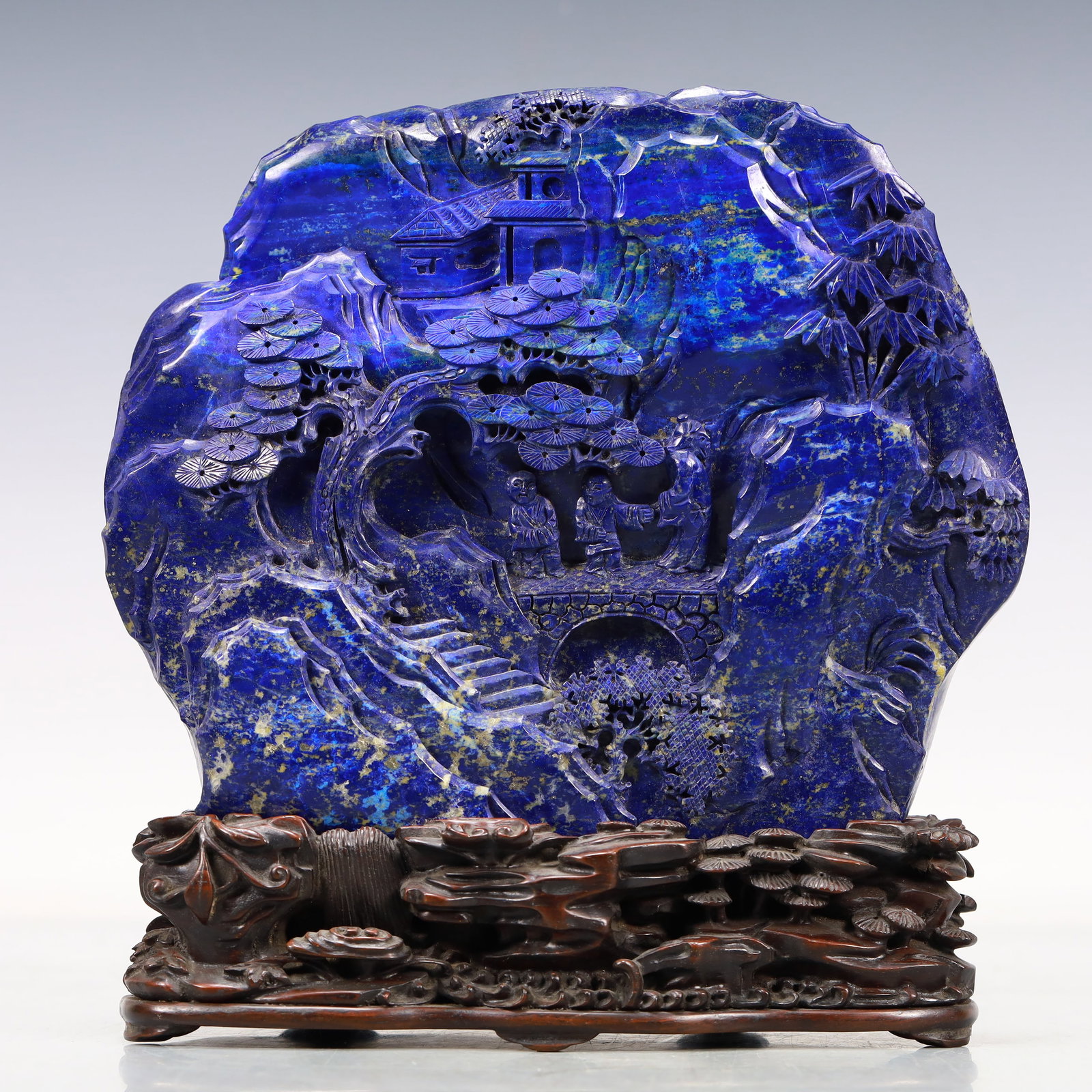 A Lapis Lazuli 'Landscape& Figure' Decoration: A Lapis Lazuli 'Landscape& Figure' Decoration With Imperial Poem Inscriptions. Carved in relief with lush pines,stairs and ancient Chinese pavilions amidst a rocky landscape. Chinese Qing Dynasty. Jia