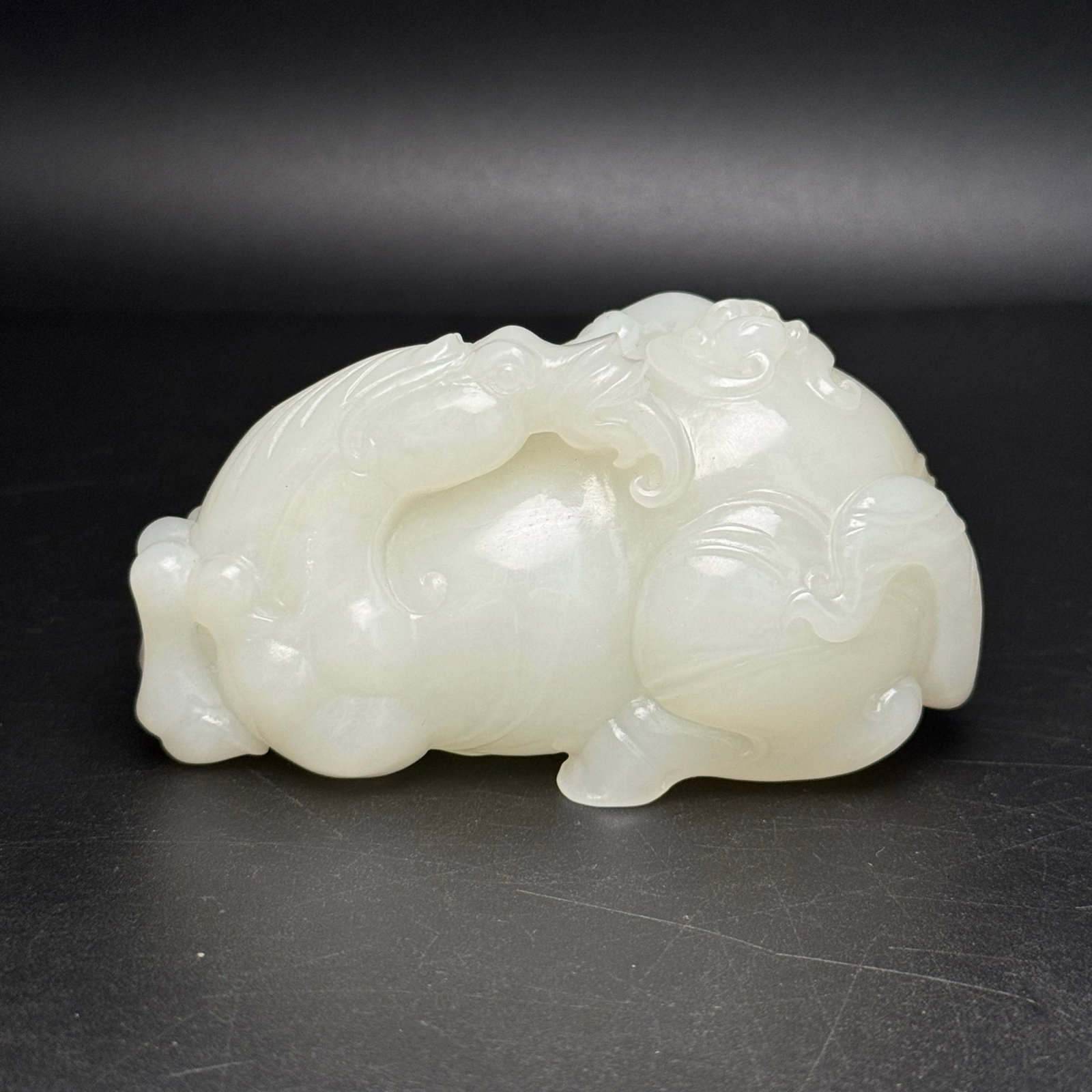 An Exquisite White Jade Horse Ornament: An Exquisite White Jade Horse Ornament,Qing Dynasty,China,Size:84mmx46mmx39mm,Weight:217g 白玉骏马摆件,中国清代