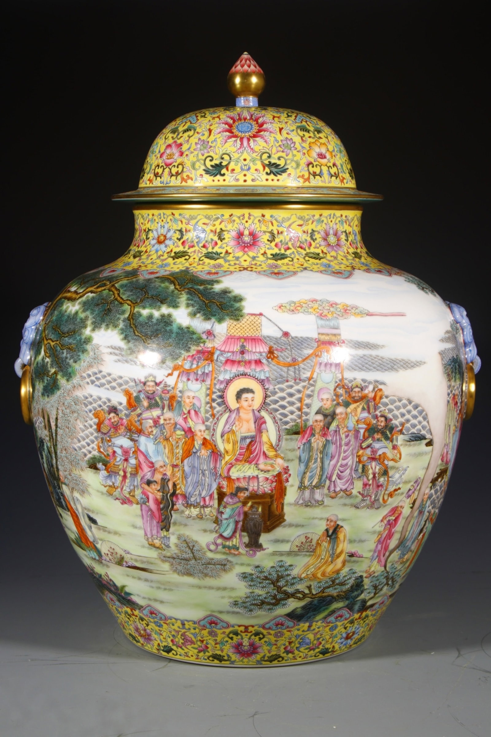 An Exquisite Yellow Ground Enamel Character and Story Pattern Lion-Ears Jar with Cover: An Exquisite Yellow Ground Enamel Character and Story Pattern Lion-Ears Jar with Cover,Qing Dynasty,China,Qianlong Four-character Mark,Size:23.2inx9.8in 黄地珐琅彩人