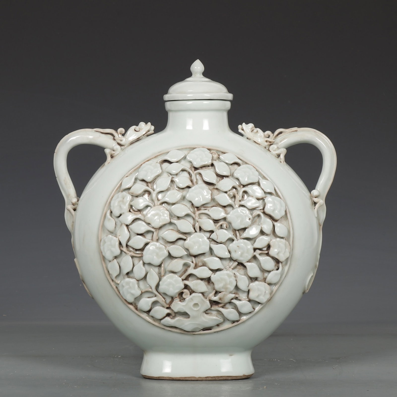 An Exquisite White Glazed Flower Pattern Pot (1 of 9)