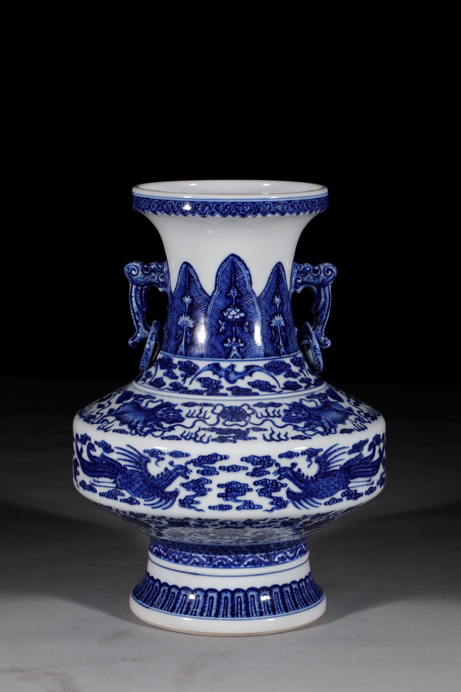 A Rare Blue and White Auspicious Cloud and Phoenix Pattern Double-Ears Vase: A Rare Blue and White Auspicious Cloud and Phoenix Pattern Double-Ears Vase,Qing Dynasty,China,Qianlong Six-character Mark,Size:14.2in 青花祥云凤纹双耳&