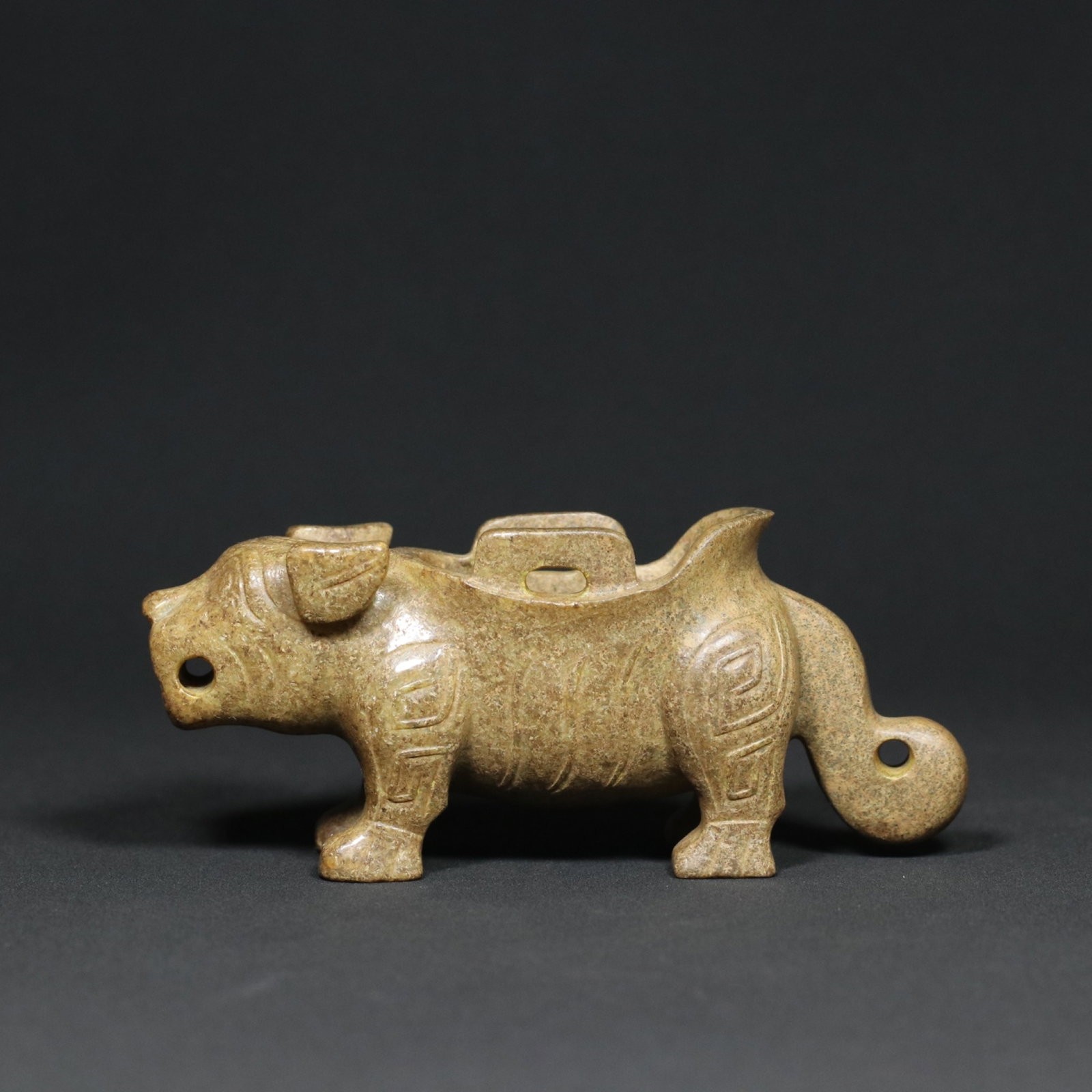 An Exquisite Archaic Jade Auspicious Beast Ornament: An Exquisite Archaic Jade Auspicious Beast Ornament,Western Zhou Dynasty,China,Size:4.5inx1.5inx1.9in,Weight:194g 高古玉瑞兽摆件,中国西Ø