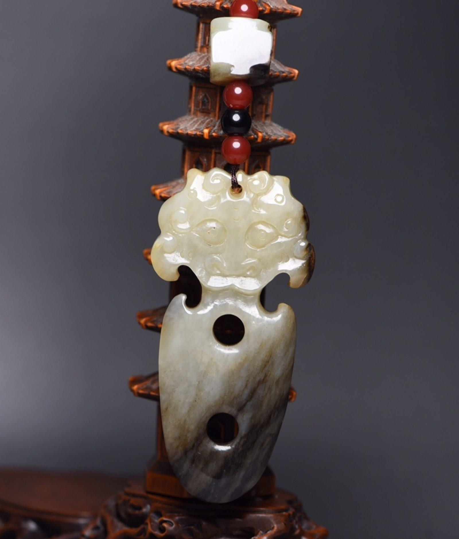 An Exquisite White Jade Beast-Face Pattern Pendant: An Exquisite White Jade Beast-Face Pattern Pendant,Qing Dynasty,China,Size:5inx1.7inx0.6in,Weight:77g 白玉兽面纹挂件,中国清代