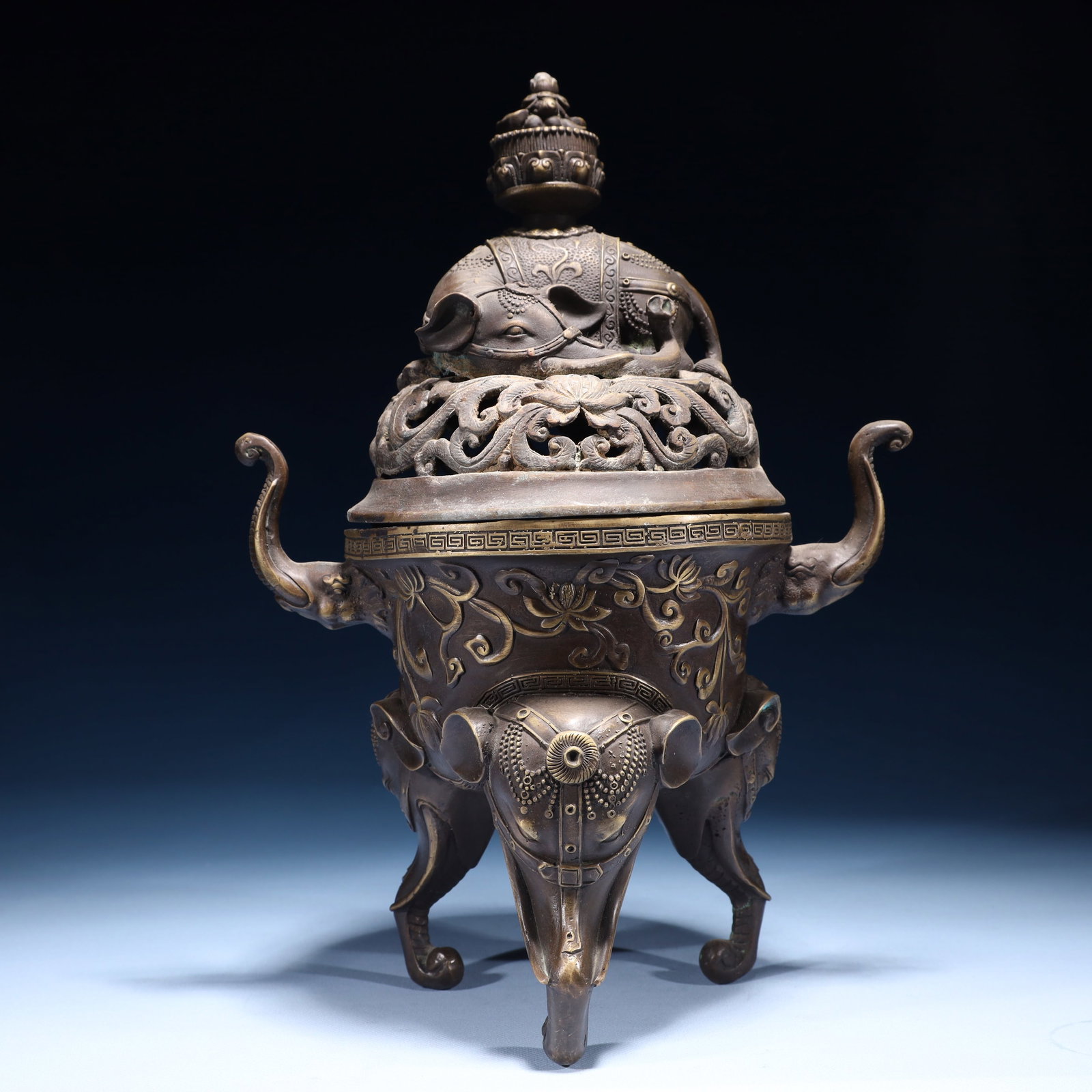 An Exquisite Bronze Flower Pattern Double-Ears and Tripod Censer: An Exquisite Bronze Flower Pattern Double-Ears and Tripod Censer,Qing Dynasty,China,Qianlong Four-character Mark,Size:9.4inx5.9inx14.6in,Weight:4250g 铜花卉纹双耳&#