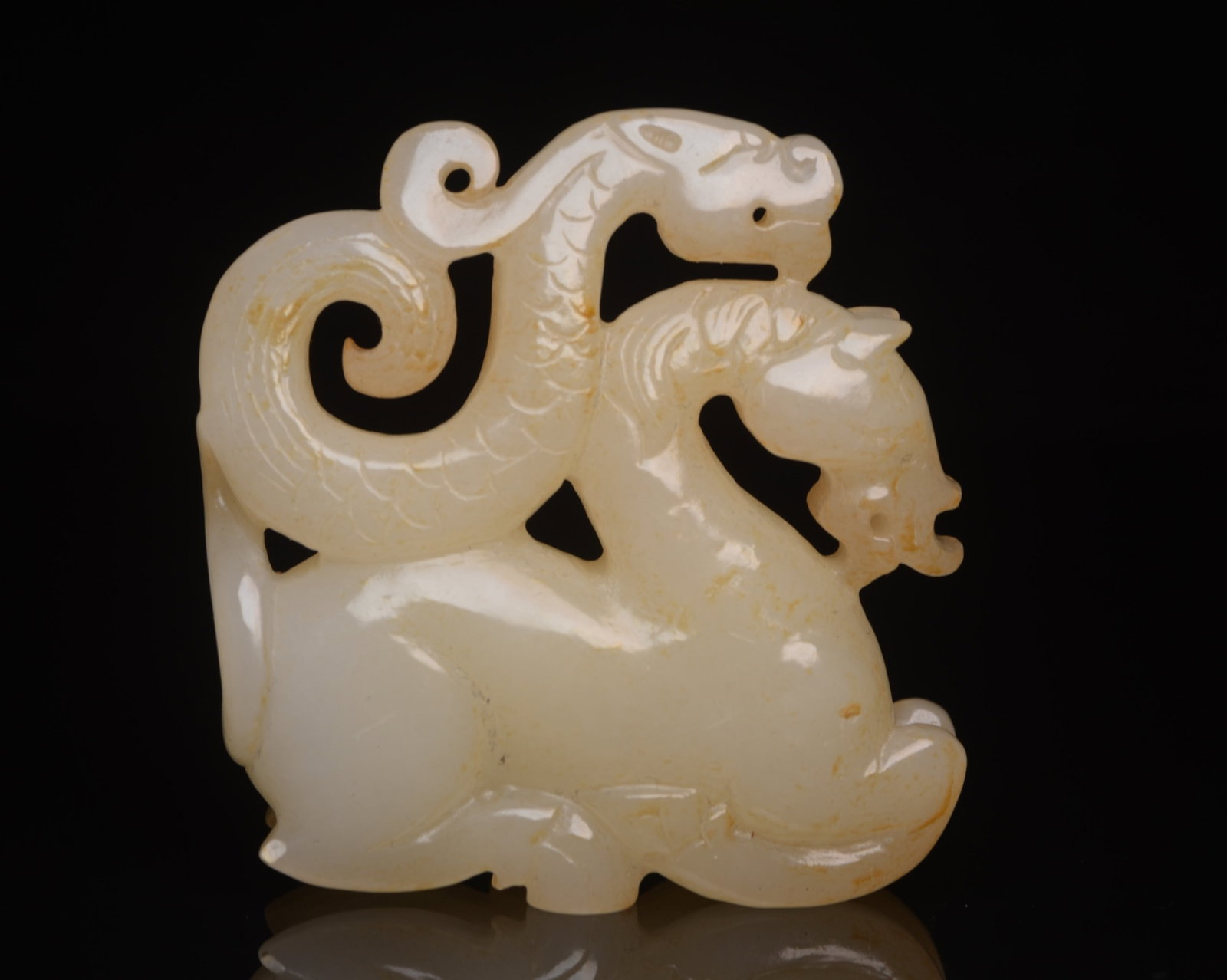 An Exquisite White Jade Auspicious Beast Ornament: An Exquisite White Jade Auspicious Beast Ornament,Qing Dynasty,China,Size:2.4inx2.4inx0.6in,Weight:91g 白玉瑞兽摆件,中国清代