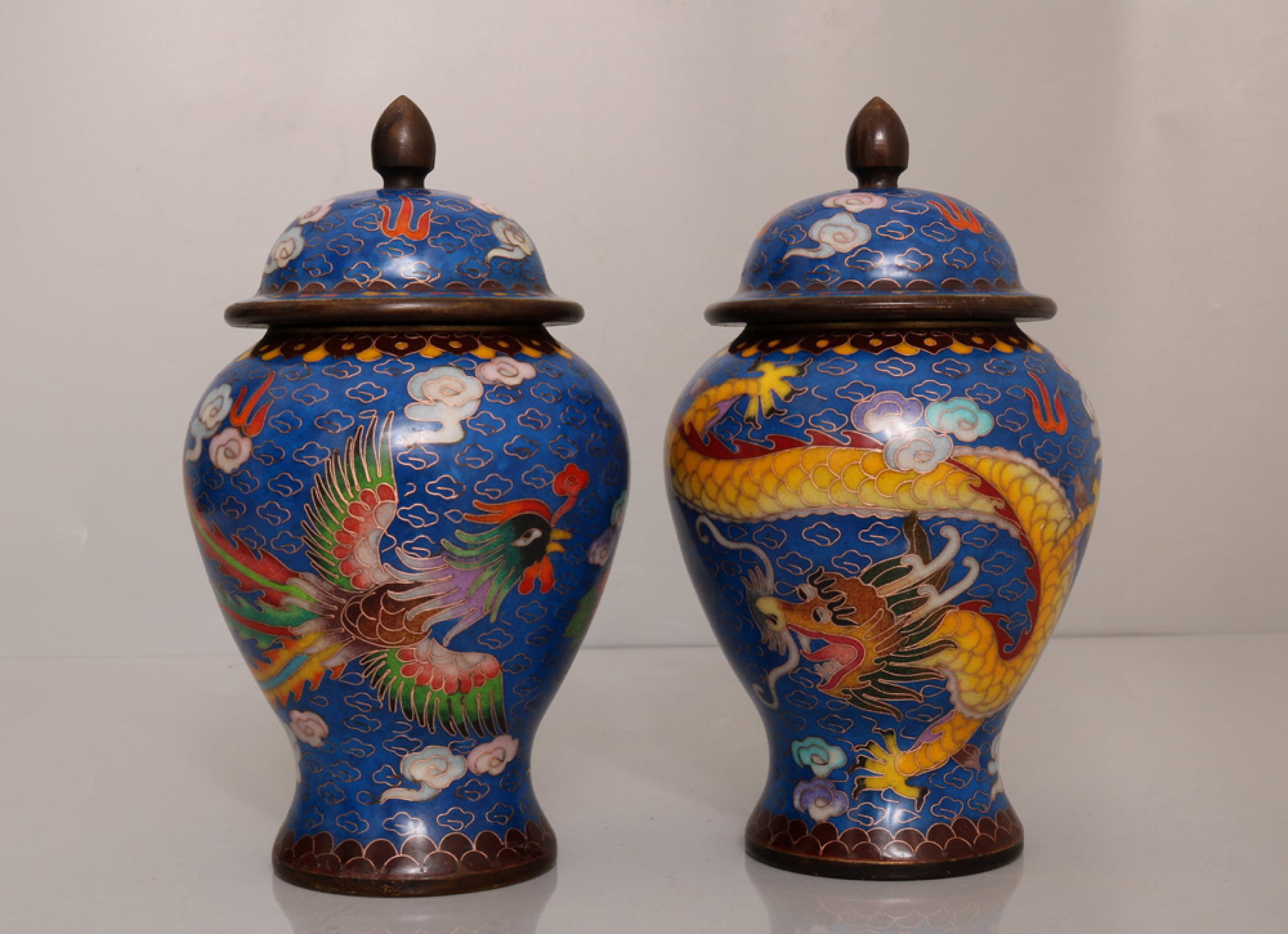 A Pair of Exquisite Cloisonne Dragon and Phoenix Pattern Jar with Covers: A Pair of Exquisite Cloisonne Dragon and Phoenix Pattern Jar with Covers,Qing Dynasty,China,Qianlong Four-Character Mark,Size:7.9inx4.3in*2,Weight:2507g 一对景泰蓝龙