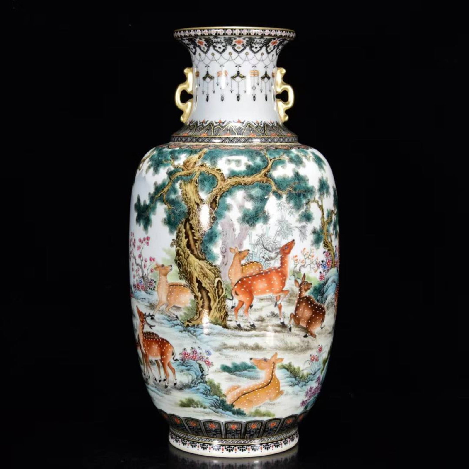 An Exquisite Famille-Rose Painted Gold Pine and Deer Pattern Double-Ears Vase: An Exquisite Famille-Rose Painted Gold Pine and Deer Pattern Double-Ears Vase,Qing Dynasty,China,Qianlong Six-character Mark,Size:12.6inx6.3in 粉彩描金松鹿纹&