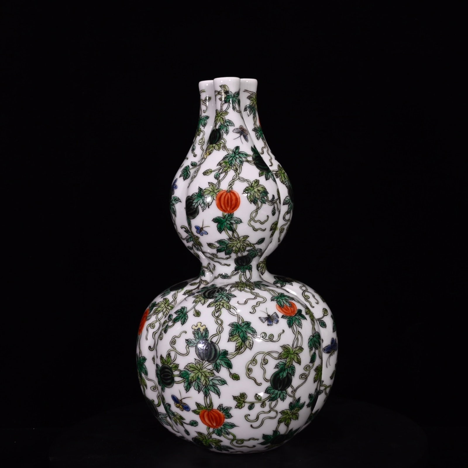 An Exquisite Wucai Melon and Fruit Pattern Gourd-Shaped Vase (1 of 9)