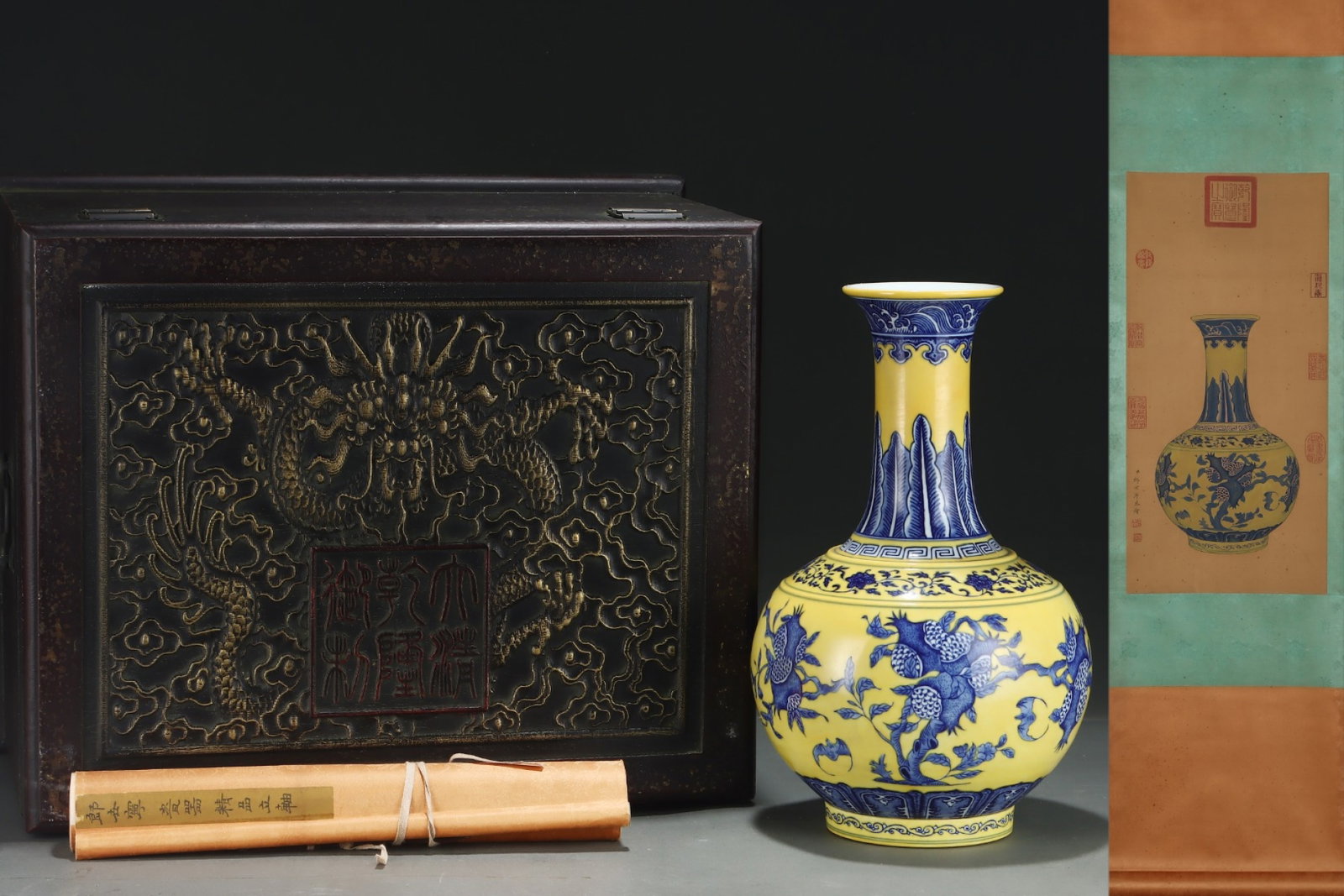 A Rare Yellow Ground Blue and White Bats and Pomegranate Pattern Vase,with Chinese Vertical Scroll: A Rare Yellow Ground Blue and White Bats and Pomegranate Pattern Vase,with Chinese Vertical Scroll Ink Painting on Silk,Qing Dynasty,China,Qianlong Six-character Mark,Size:(Porcelain)14.6inx8.9in,(Wit