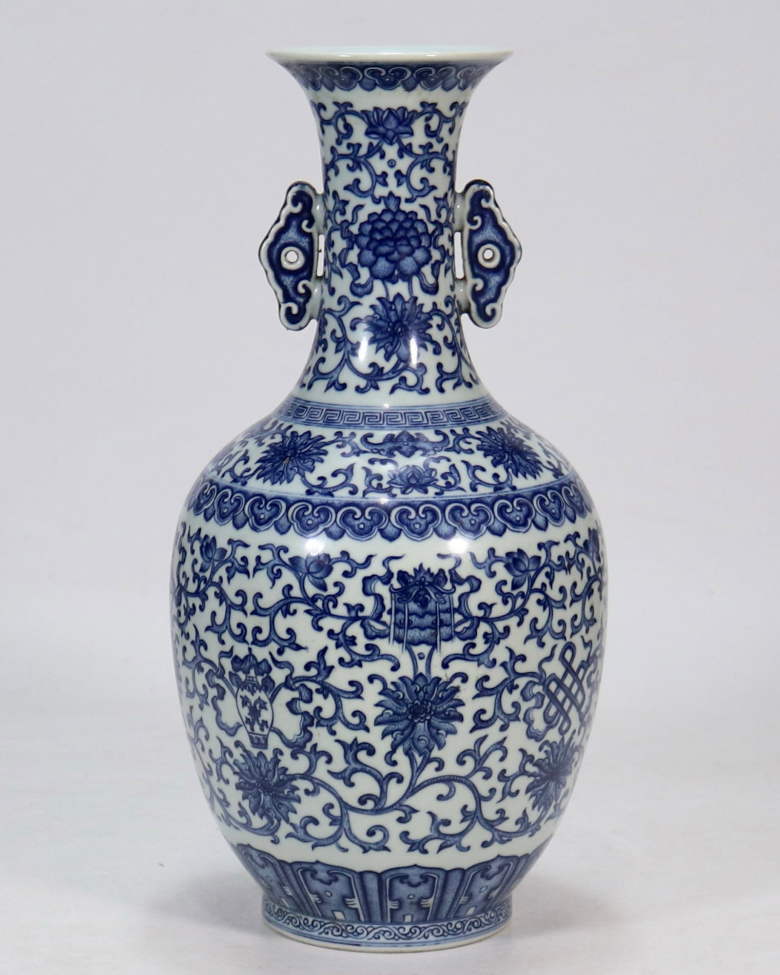 An Exquisite Blue and White Lotus Pattern Double-Ears Vase: An Exquisite Blue and White Lotus Pattern Double-Ears Vase,Qing Dynasty,China,Qianlong Six-character Mark,Size:15inx4.1in