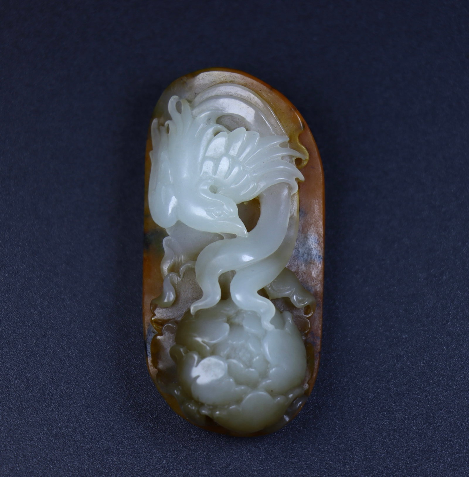 An Exquisite Seed Material Flower and Bird Pattern Pendant: An Exquisite Seed Material Flower and Bird Pattern Pendant,Qing Dynasty,China,Size:2.6inx1.2inx0.8in,Weight:64g