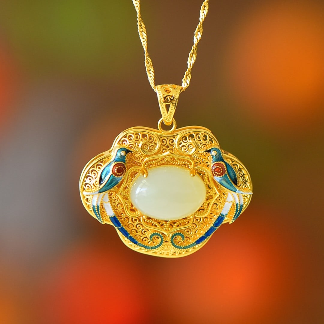 An Exquisite Sterling Silver-Gold Plated Inlaid White Jade Pendant: An Exquisite Sterling Silver-Gold Plated Inlaid White Jade Pendant 纯银镀金镶白玉吊坠