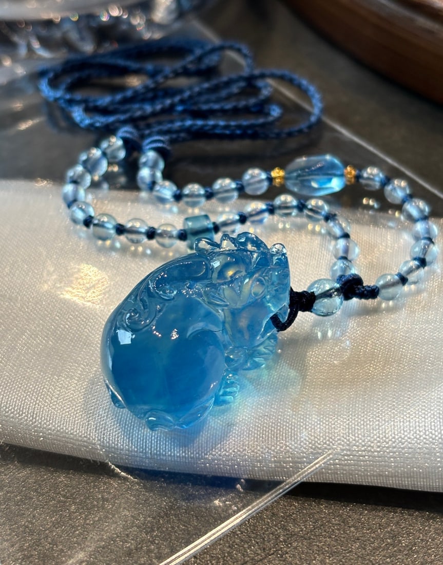 An Exquisite Aquamarine Wealth-Attracting Creature Necklace: An Exquisite Aquamarine Wealth-Attracting Creature Necklace,Size:30mmx20mmx18mm总19.2g 海蓝宝貔貅吊坠