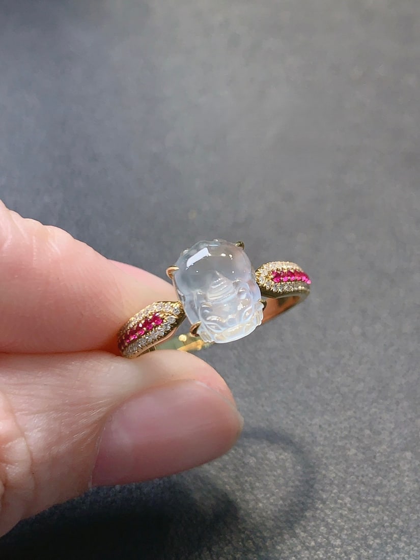 An Exquisite 18k Gold Diamond Inlaid Jadeite Ring: An Exquisite 18k Gold Diamond Inlaid Jadeite Ring,Size(Loose Stone):9mmx7.1mmx3.7mm #13 18k金钻镶嵌翡翠戒指