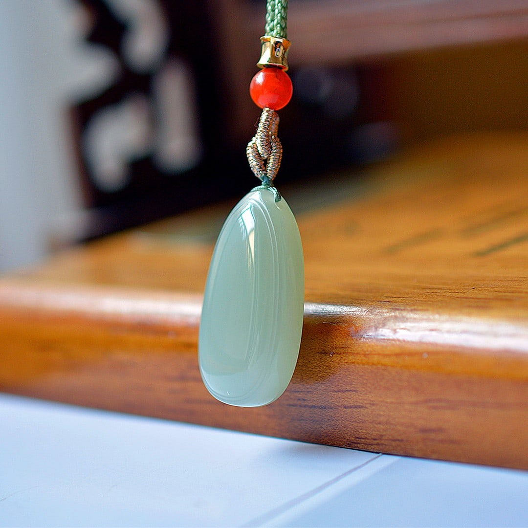 An Exquisite Greenish Jade Pendant: An Exquisite Greenish Jade Pendant,Size:17mmx31mm 青玉挂件