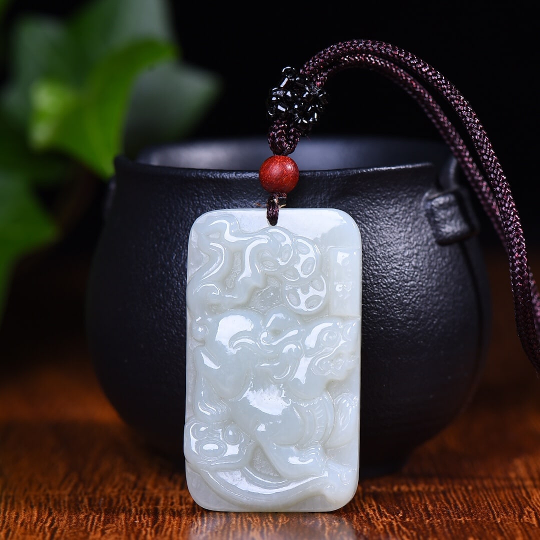 An Exquisite White Jade Wealth-Attracting Creature Pendant: An Exquisite White Jade Wealth-Attracting Creature Pendant,Size:26mmx45mm 白玉貔貅挂件