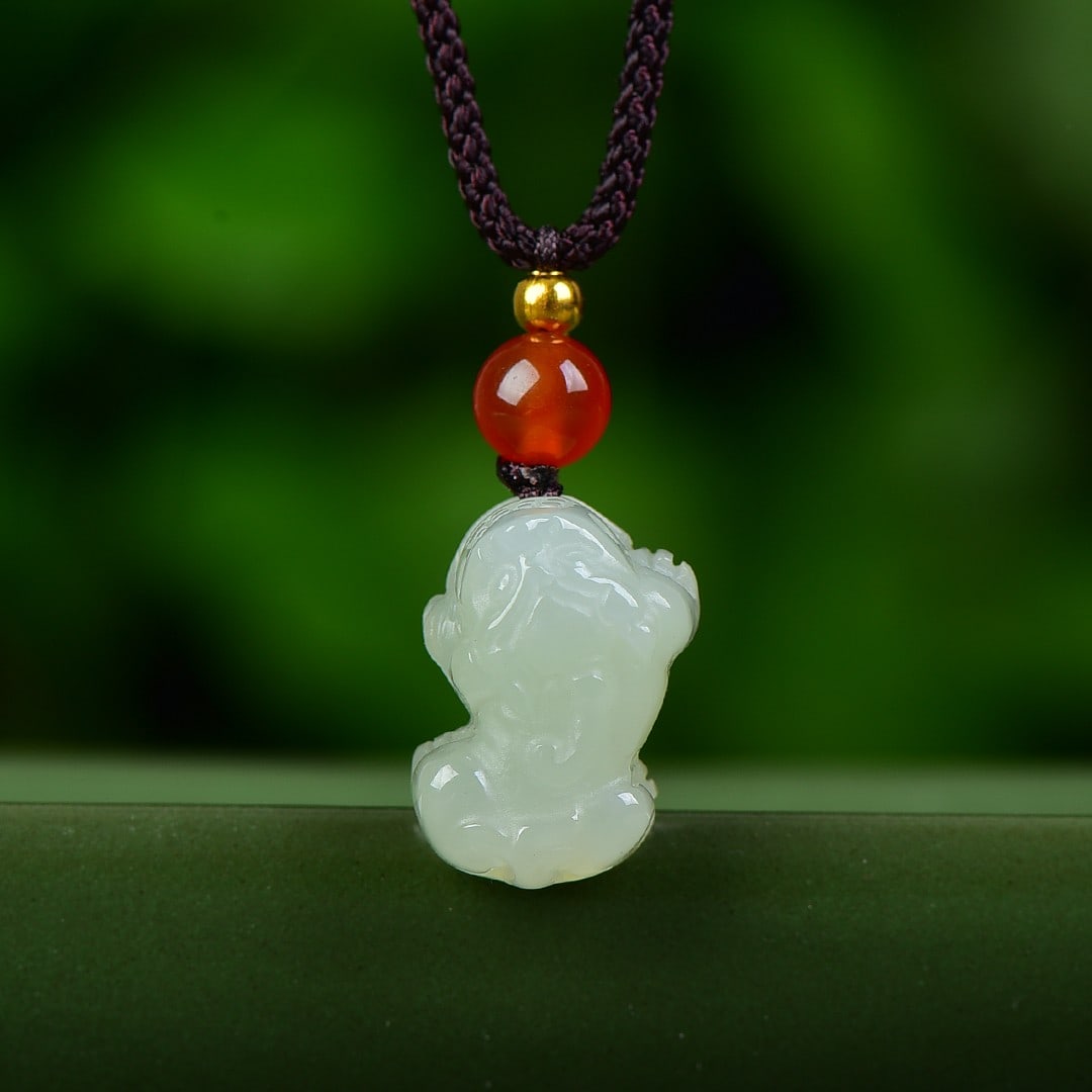 An Exquisite White Jade Wealth-Attracting Creature Pendant: An Exquisite White Jade Wealth-Attracting Creature Pendant,Size:12mmx17mm 白玉貔貅挂件