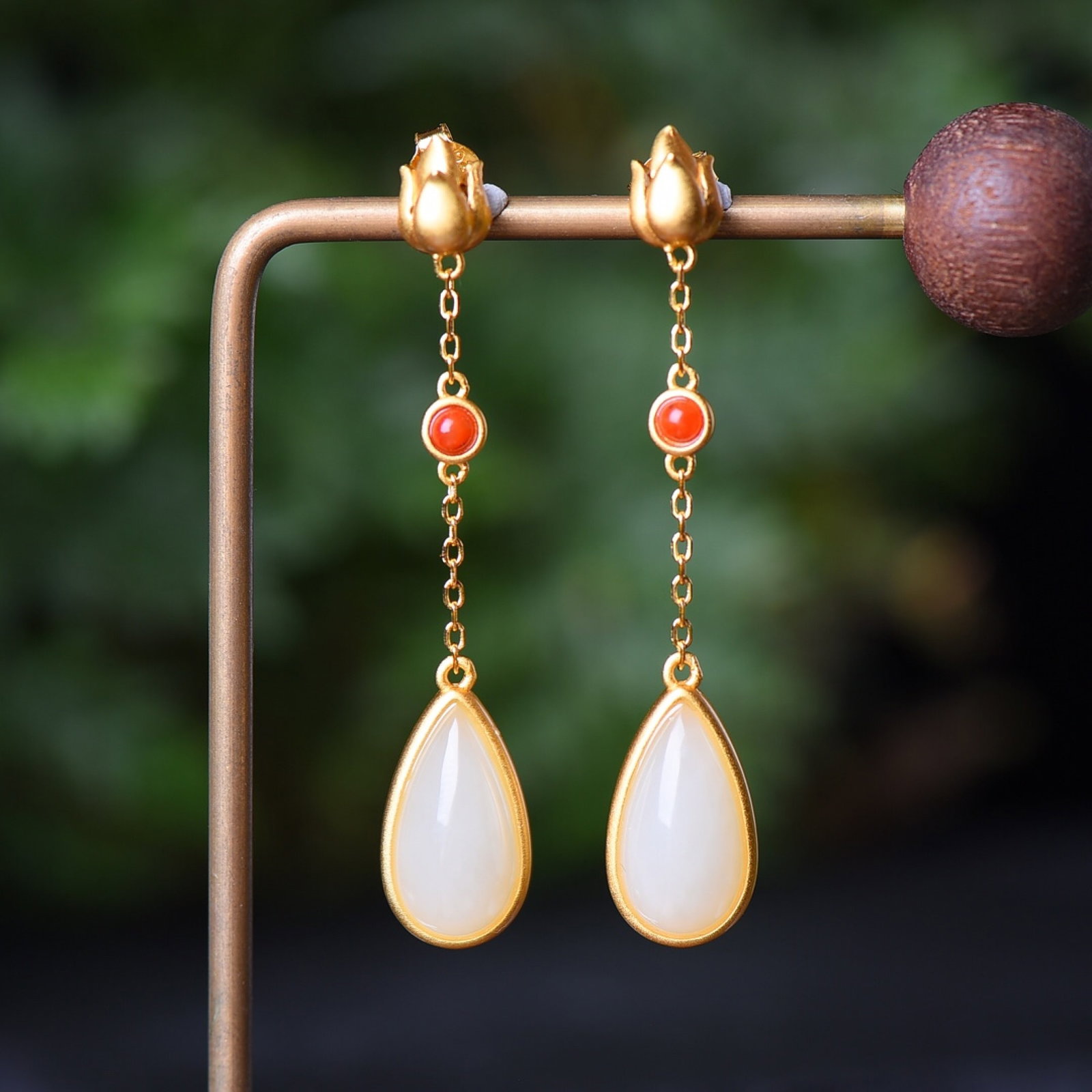 A Pair of Exquisite Sterling Silver-Gold Plated Inlaid White Jade Earrings: Estimated Value:300-600 A Pair of Exquisite Sterling Silver-Gold Plated Inlaid White Jade Earrings,Size:8mmx16mm