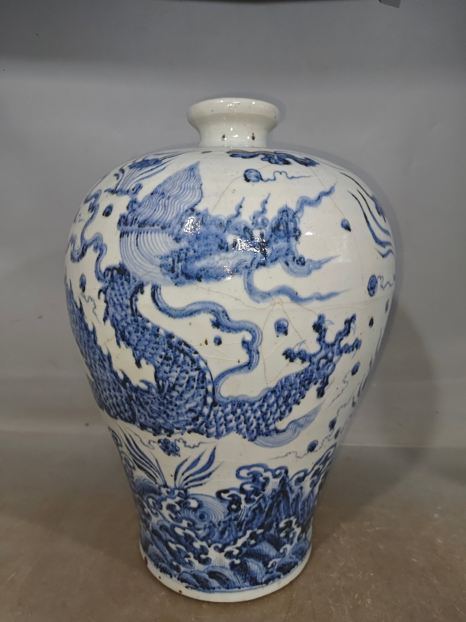 A Huge Blue and White Seawater and Dragon Pattern Vase: Estimated Value:3600-7200 A Huge Blue and White Seawater and Dragon Pattern Vase,Qing Dynasty,China,Size:8.7inx16.3in
