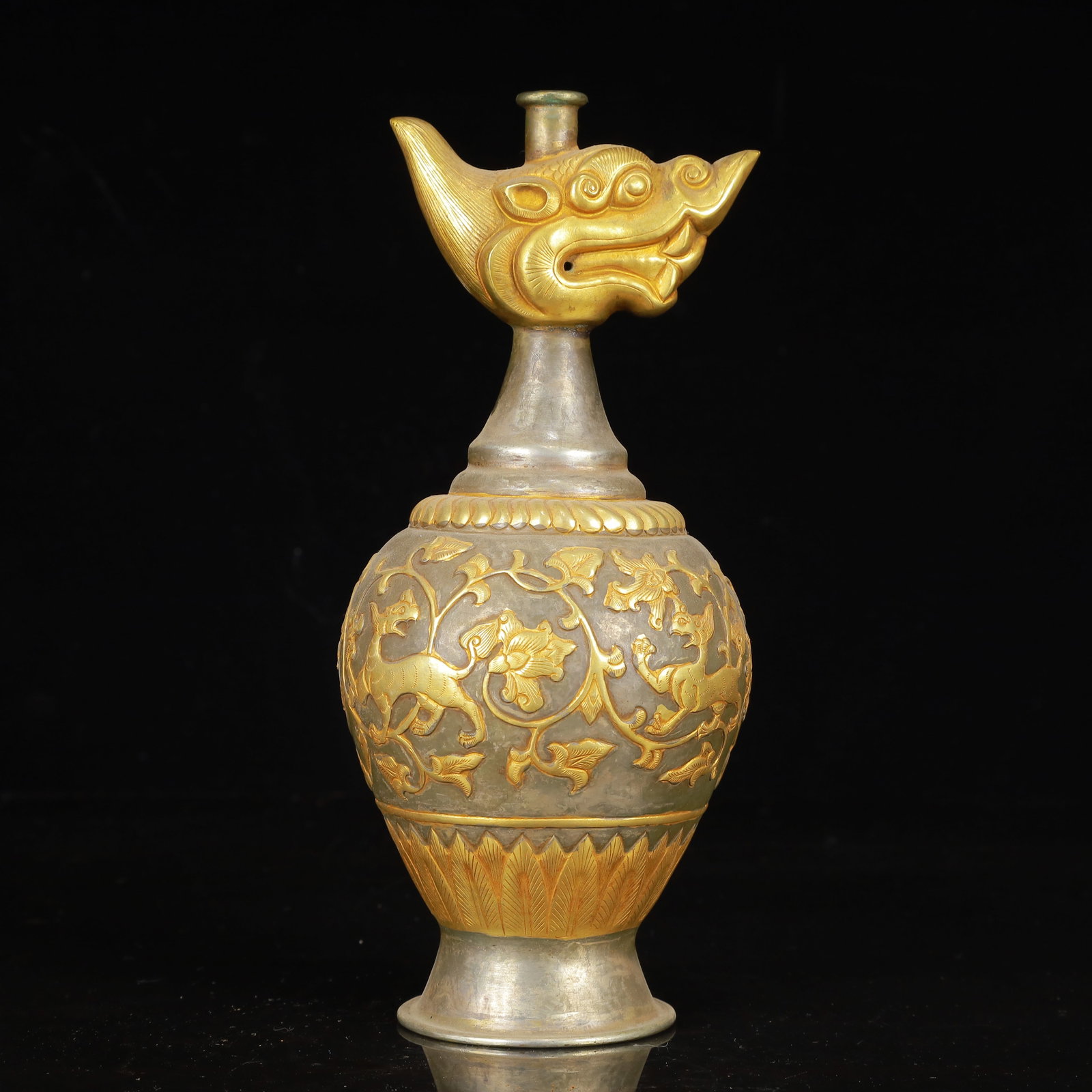 An Exquisite Gilt Silver Auspicious Beast Pattern Vase: Estimated Value:1600-3200 An Exquisite Gilt Silver Auspicious Beast Pattern Vase,Qing Dynasty,China,Size:3.9inx8.7in,Weight:450g