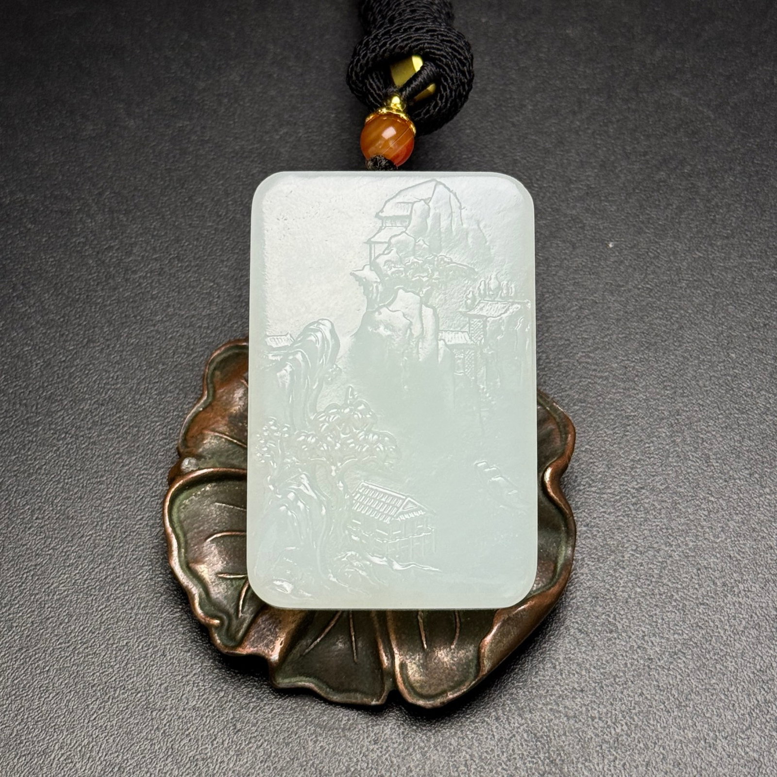 An Exquisite White Jade Landscape Pattern Pendant (1 of 7)