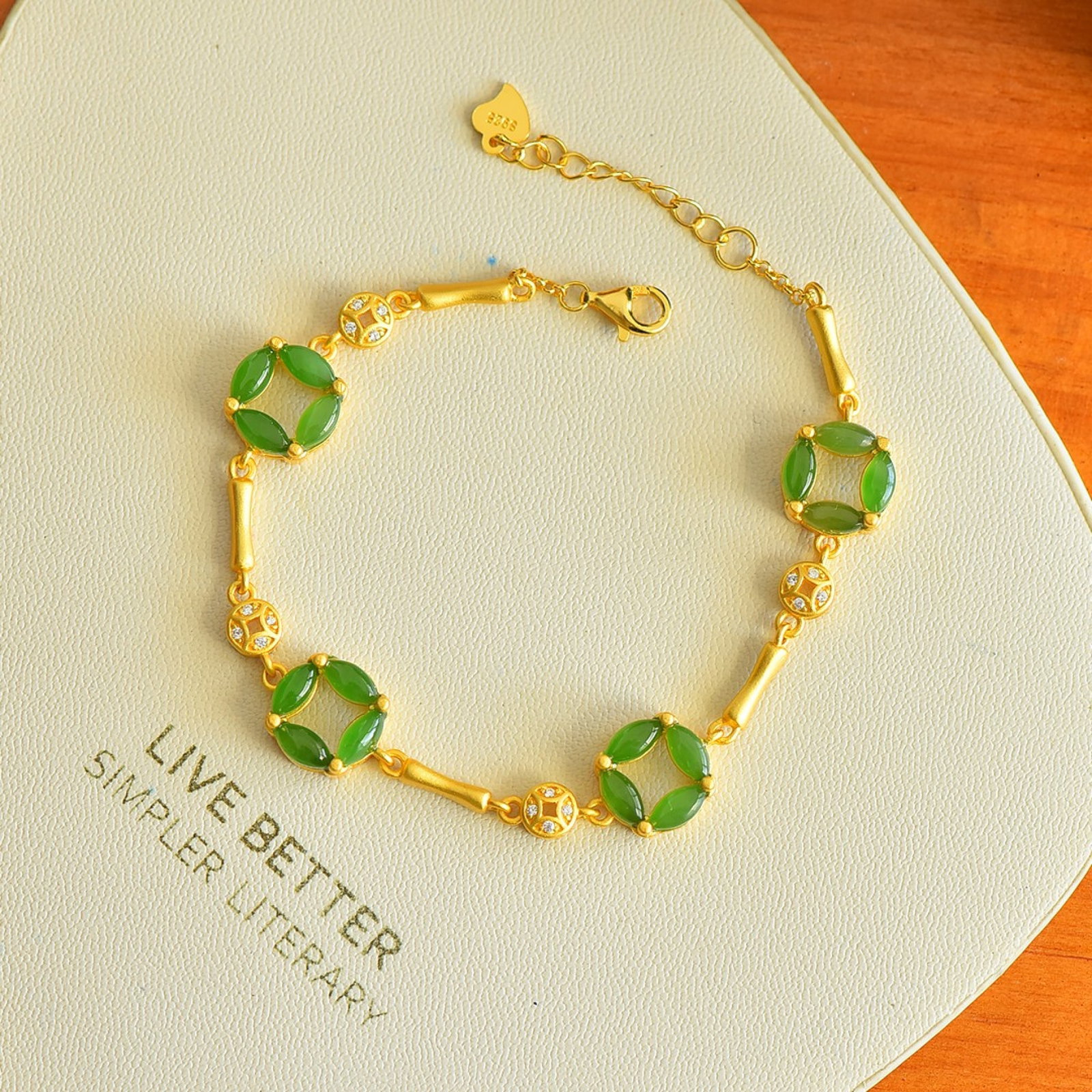 An Exquisite Sterling Silver-Gold Plated Inlaid Jasper Bracelets,Inlaid Diamond: Estimated Value:640-1280 An Exquisite Sterling Silver-Gold Plated Inlaid Jasper Bracelets,Inlaid Diamond,Size:3mmx6mm