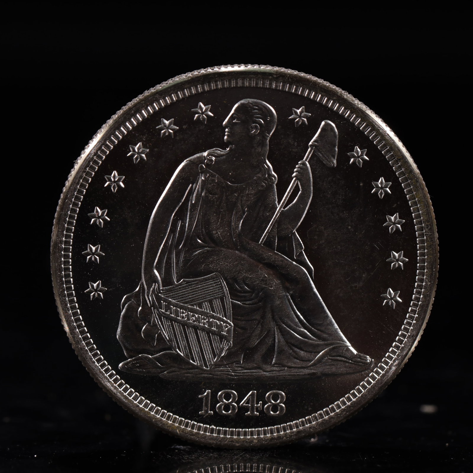 USA One Dollar 1848 Coin: Estimated Value:2000-4000 American coin. IN GOD WE TRUST / LIBERTY / 1848 / UNITED STATES OF AMERICA / ONE DOL. Weight:26.9g.