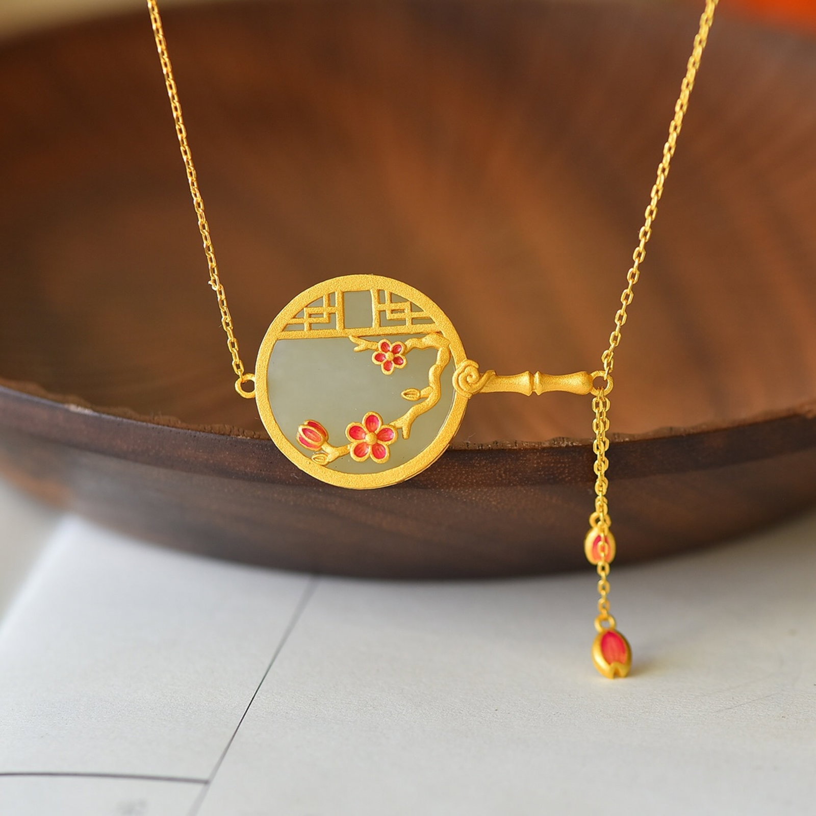 An Exquisite Sterling Silver-Gold Plated Inlaid White Jade Enamel Pendant: Estimated Value:300-600 An Exquisite Sterling Silver-Gold Plated Inlaid White Jade Enamel Pendant,Size:20mmx20mm 纯银镀金镶白玉珐琅吊坠