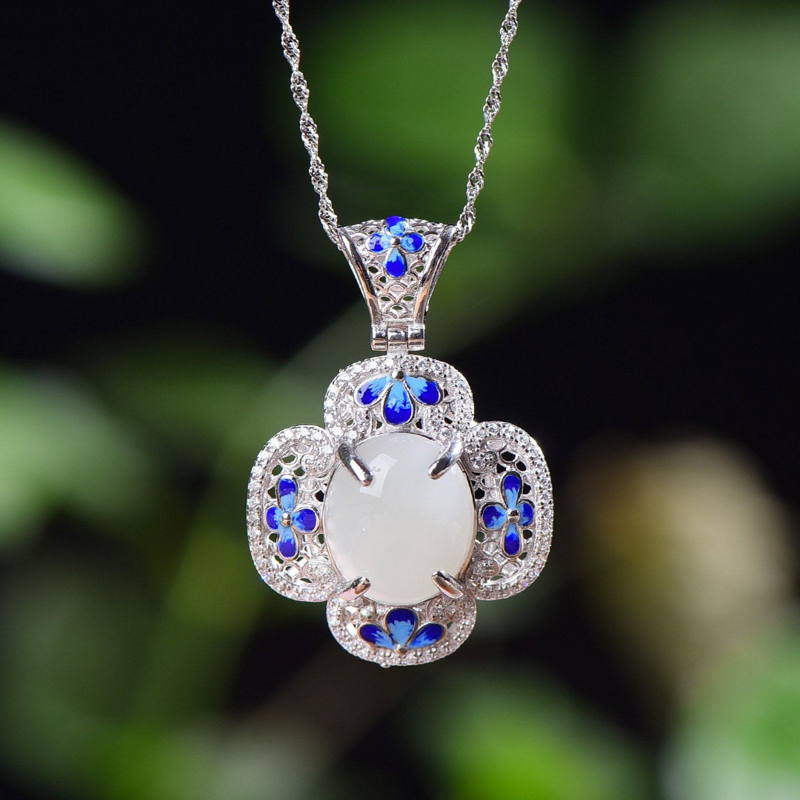 An Exquisite Sterling Silver Inlaid White Jade Enamel Pendant,Inlaid Diamond: Estimated Value:600-1200 An Exquisite Sterling Silver Inlaid White Jade Enamel Pendant,Inlaid Diamond,Size:12mmx14mm