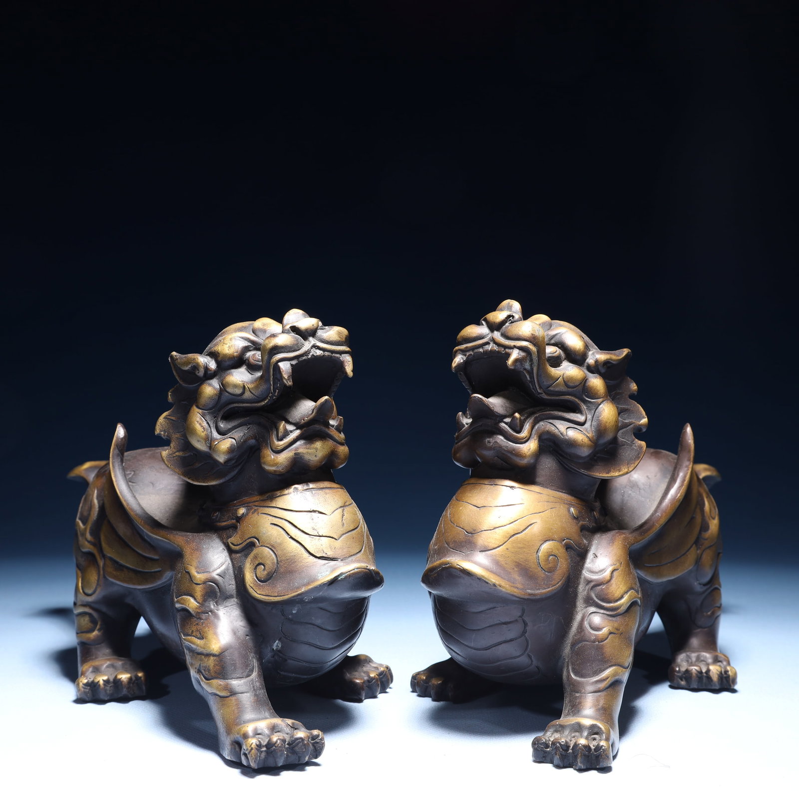 A Pair of Exquisite Bronze Wealth-Attracting Creature Ornaments: Estimated Value:2000-4000 A Pair of Exquisite Bronze Wealth-Attracting Creature Ornaments,Qing Dynasty,China,Size:8.3inx4.3inx5.9in,Weight:3450g