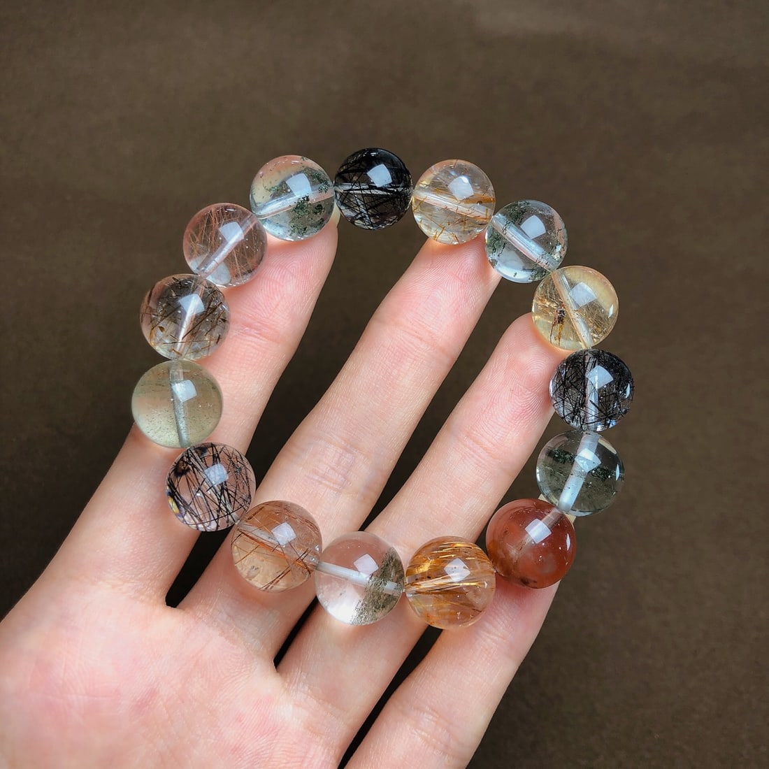 An Exquisite Multi-Gem Bracelets: Estimated Value:2000-4000 An Exquisite Multi-Gem Bracelets,Size:13mm,Weight:45.2g 多宝手串