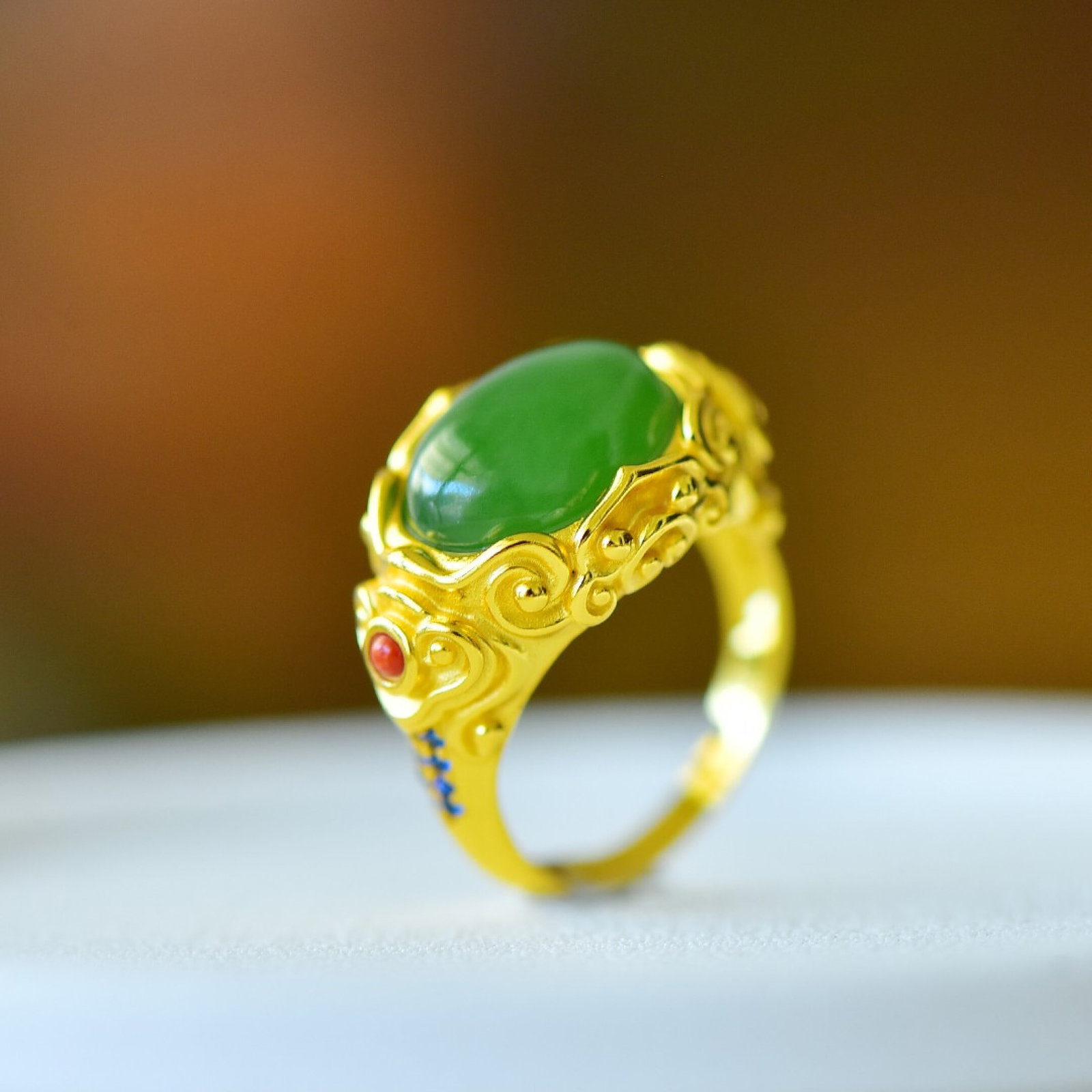 An Exquisite Sterling Silver-Gold Plated Inlaid Jasper Ring: Estimated Value:300-600 An Exquisite Sterling Silver-Gold Plated Inlaid Jasper Ring,Size:10mmx14mm 纯银镀金镶碧玉戒指