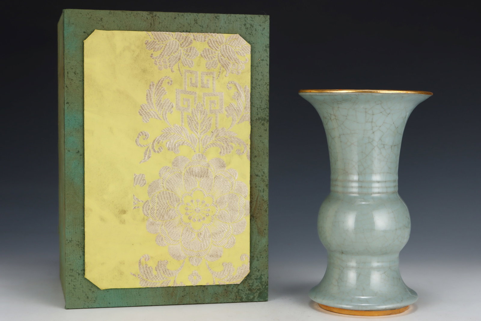 An Exquisite Guan yao Cover with Gold Flower Pattern Vase,Inlaid Gems: Estimated Value:2200-4400 An Exquisite Guan yao Cover with Gold Flower Pattern Vase,Inlaid Gems,Song Dynasty,China,Size:8.9inx5.4in