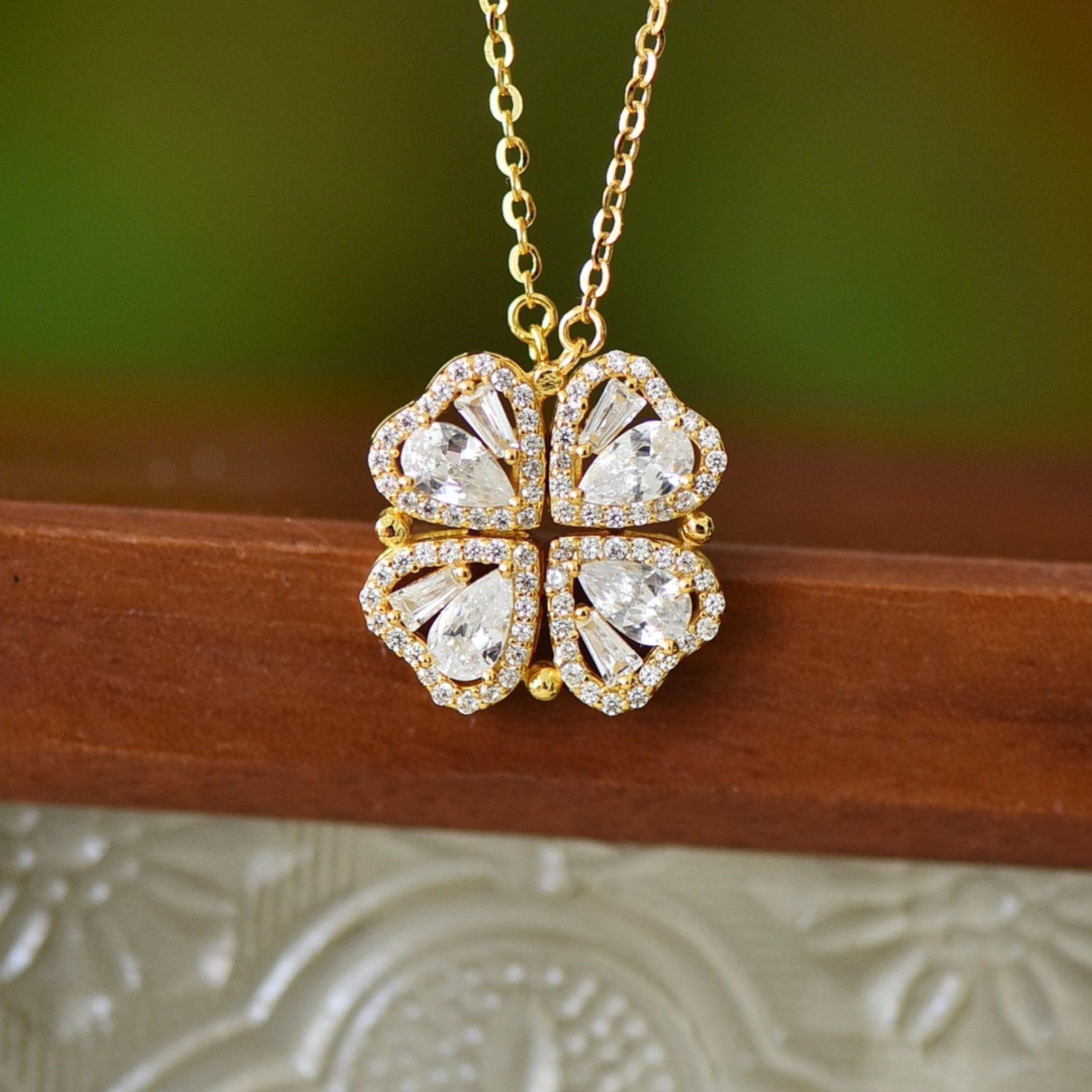 An Exquisite Sterling Silver-Gold Plated Inlaid Diamond Pendant: Estimated Value:200-400 An Exquisite Sterling Silver-Gold Plated Inlaid Diamond Pendant, 纯银镀金镶钻石吊坠