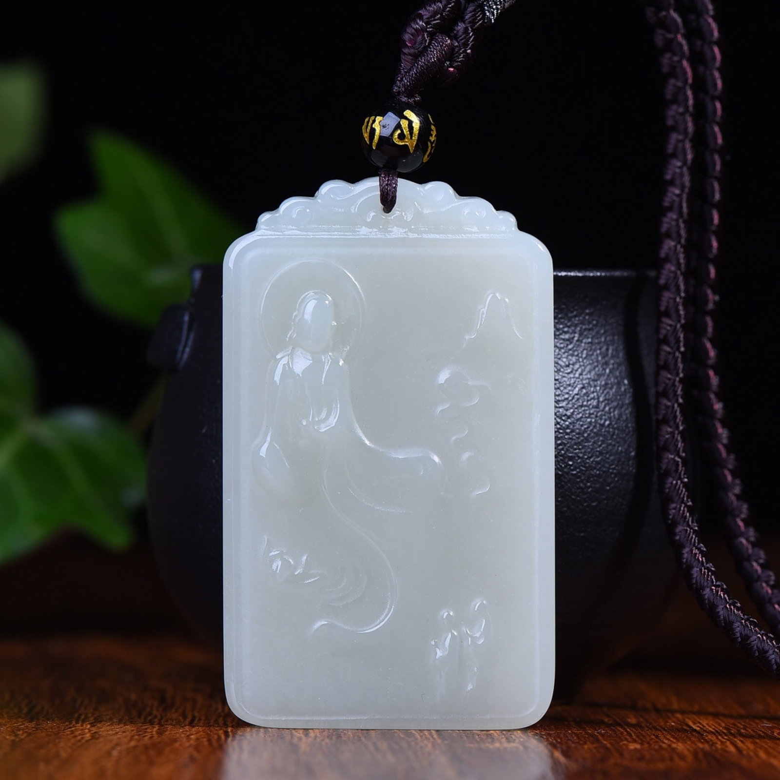 An Exquisite White Jade Buddha Pattern Pendant: Estimated Value:1000-2000 An Exquisite White Jade Buddha Pattern Pendant,Size:36mmx60mm (寓意)吉祥 玉质温润