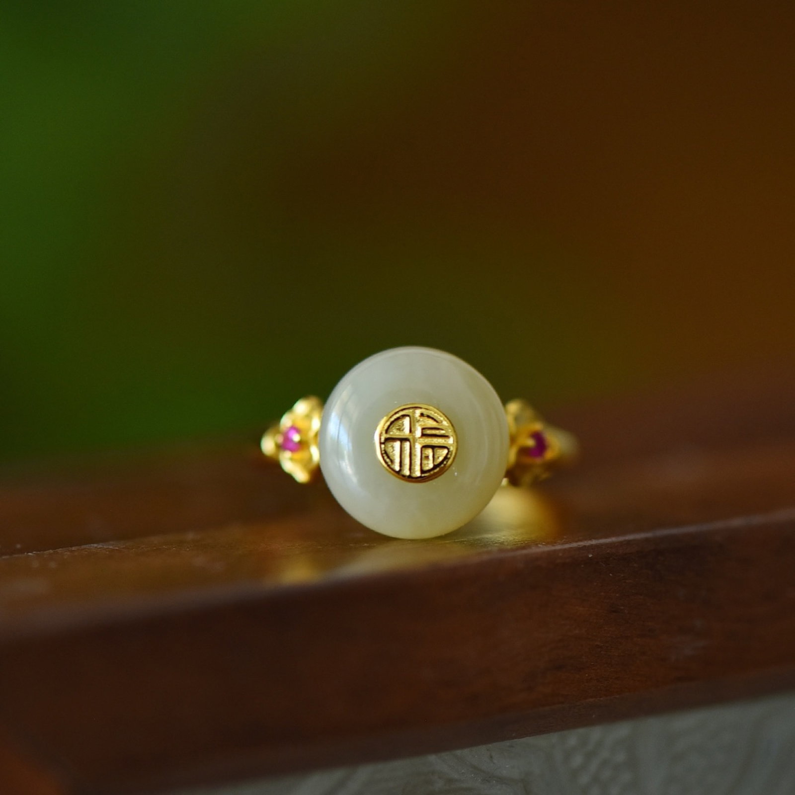 An Exquisite Sterling Silver-Gold Plated Inlaid White Jade Ring,Inlaid Gems: Estimated Value:200-400 An Exquisite Sterling Silver-Gold Plated Inlaid White Jade Ring,Inlaid Gems Size:12mmx12mm