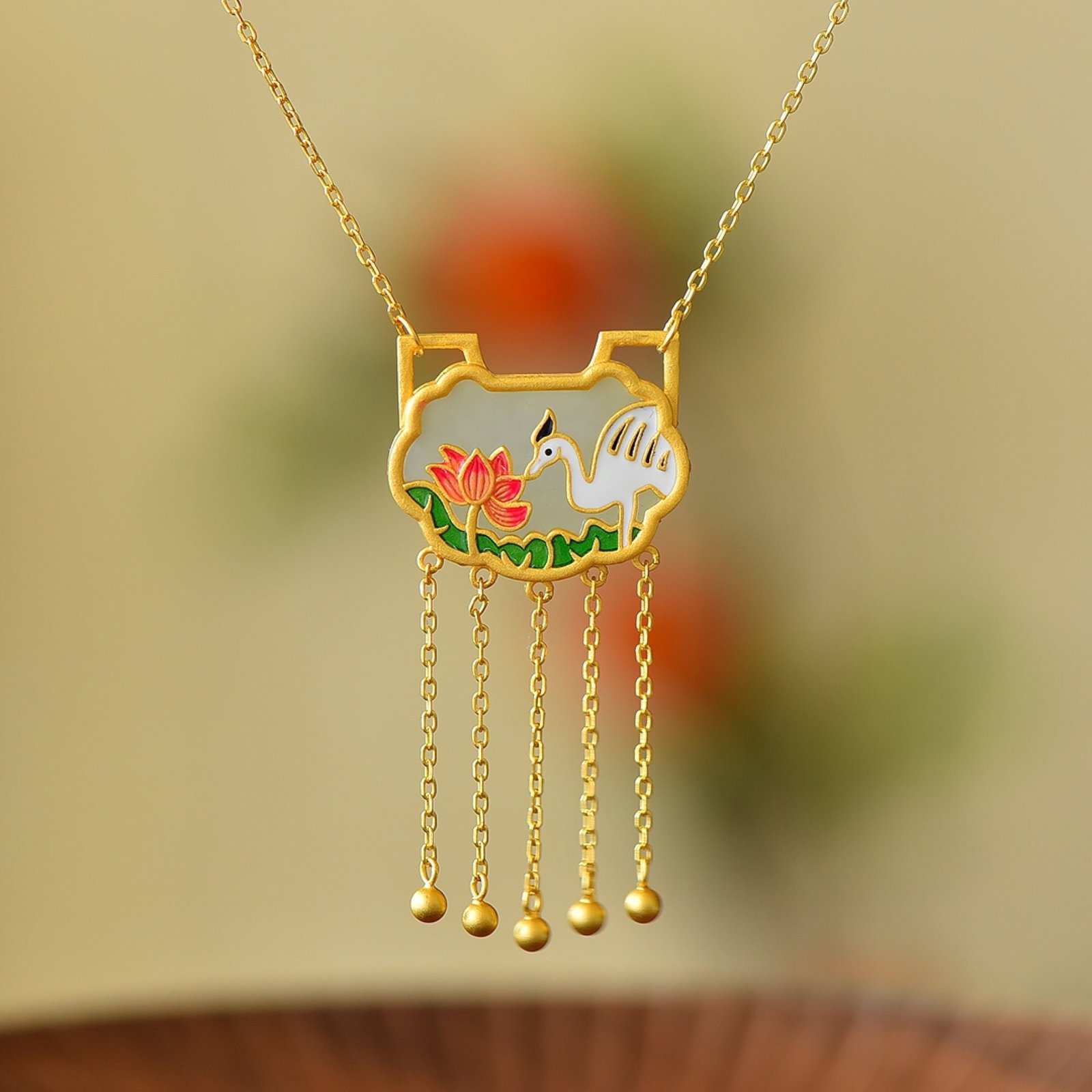 An Exquisite Sterling Silver-Gold Plated Inlaid White Jade Enamel Pendant: Estimated Value:300-600 An Exquisite Sterling Silver-Gold Plated Inlaid White Jade Enamel Pendant,Size:17mmx24mm 纯银镀金镶白玉珐琅吊坠
