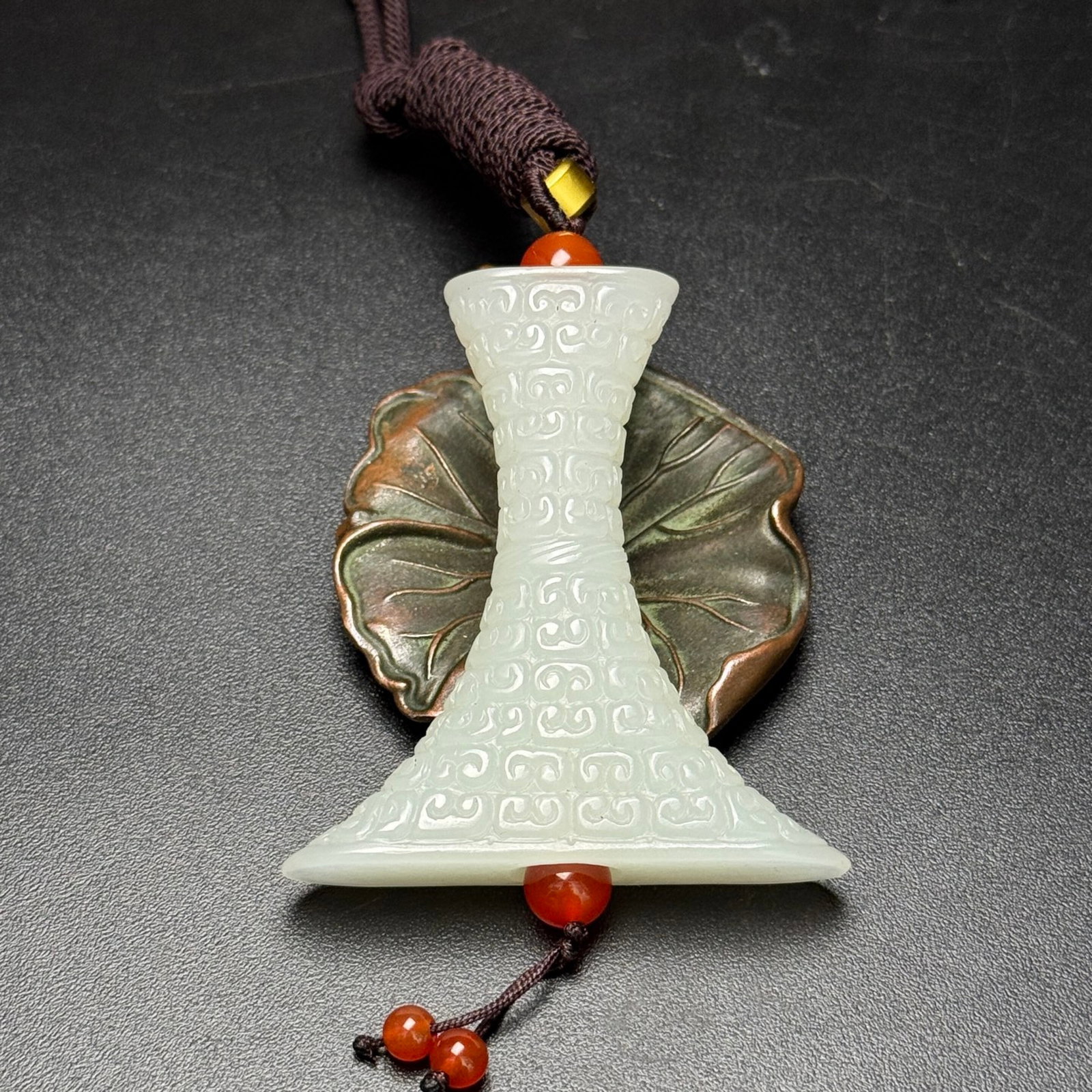 An Exquisite White Jade Ruyi Pattern Pendant: Estimated Value:720-1500 An Exquisite White Jade Ruyi Pattern Pendant,Qing Dynasty,China,Size:52mmx58mmx12mm,Weight:39g