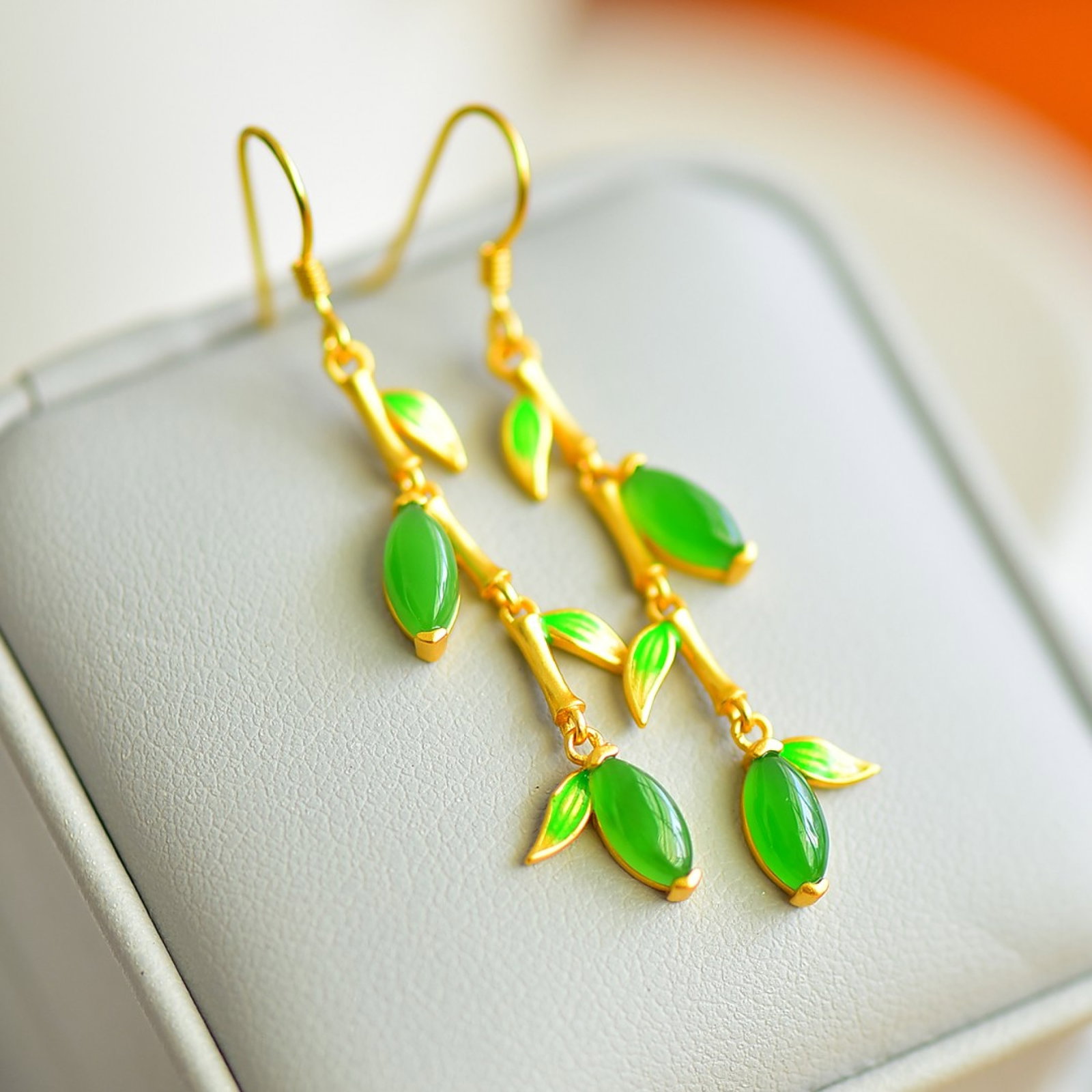 A Pair of Exquisite Sterling Silver-Gold Plated Inlaid Jasper Earrings: Estimated Value:400-800 A Pair of Exquisite Sterling Silver-Gold Plated Inlaid Jasper Earrings,Size:4mmx8mm 一对纯银镀金镶碧玉耳环
