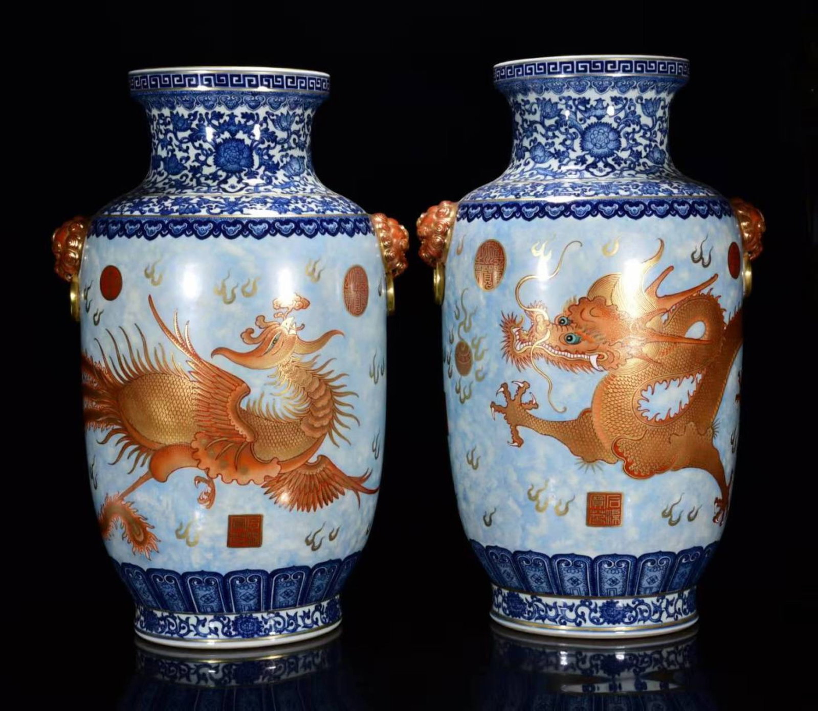 A Pair of Huge Blue and White Jiacai Painted Gold Dragon and Phoenix Pattern Lion-Ears Vases: Estimated Value:22000-44000 A Pair of Huge Blue and White Jiacai Painted Gold Dragon and Phoenix Pattern Lion-Ears Vases,Qing Dynasty, China,Qianlong Four-character Mark,Size:23.6inx14.2in