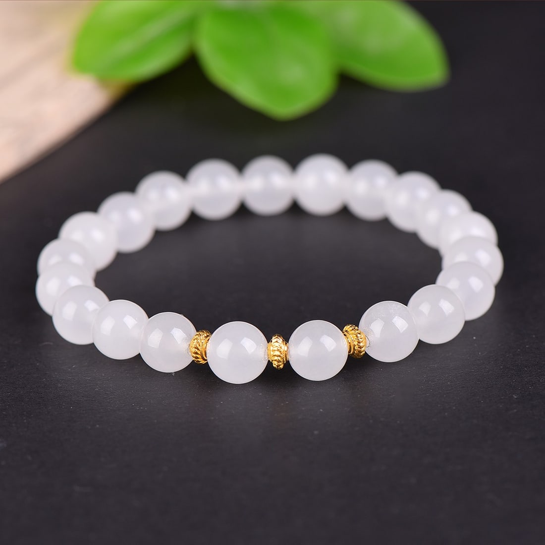 An Exquisite White Jade Bracelets: Estimated Value:200-400 An Exquisite White Jade Bracelets,Size:8mm